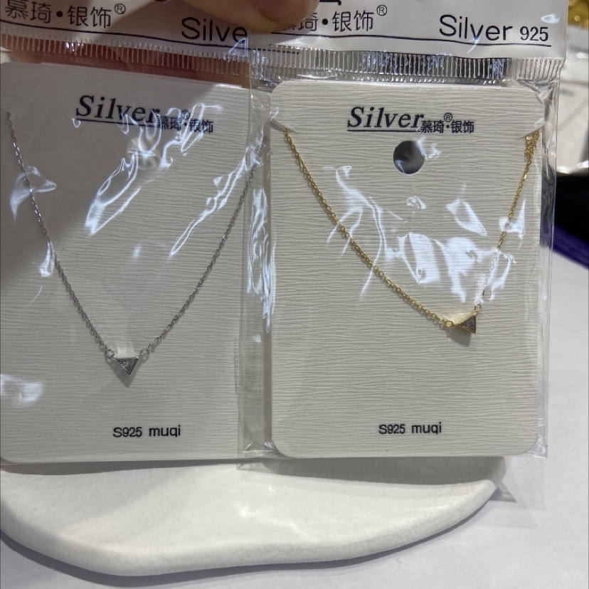 A small triangular zircon necklace