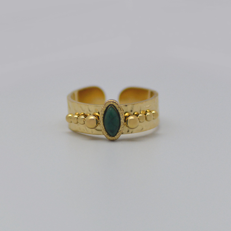 A French retro women's ring with a concave-convex texture, a stainless steel ring set with teardrop-shaped black turquoise and titanium steel plated with 14k gold Specification image