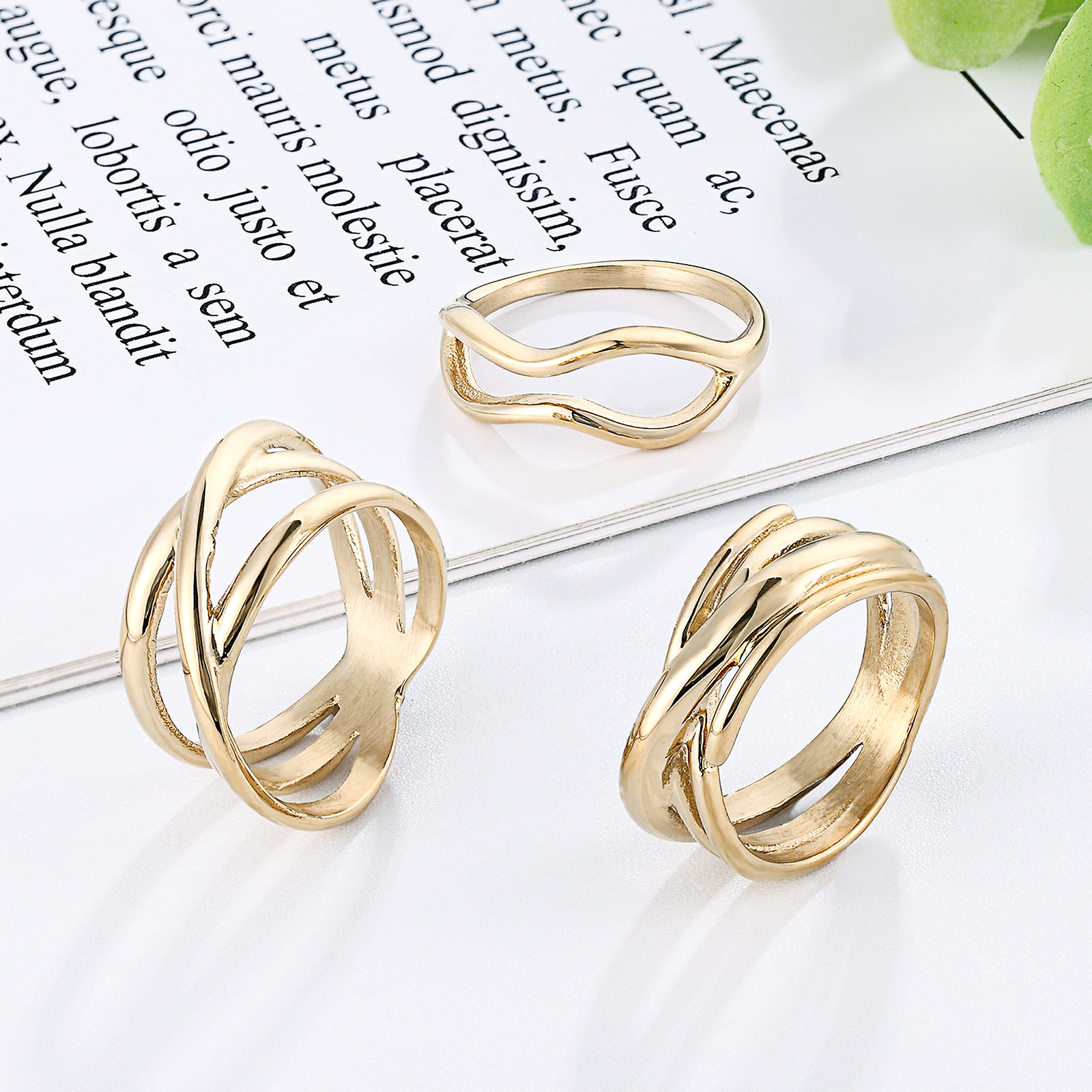 Direct supply of fashionable Korean-style trendy women's rings from the manufacturer. Twisted titanium steel rings, simple cross European and American index finger rings, 14k geometric rings, cross-border wholesale details Picture