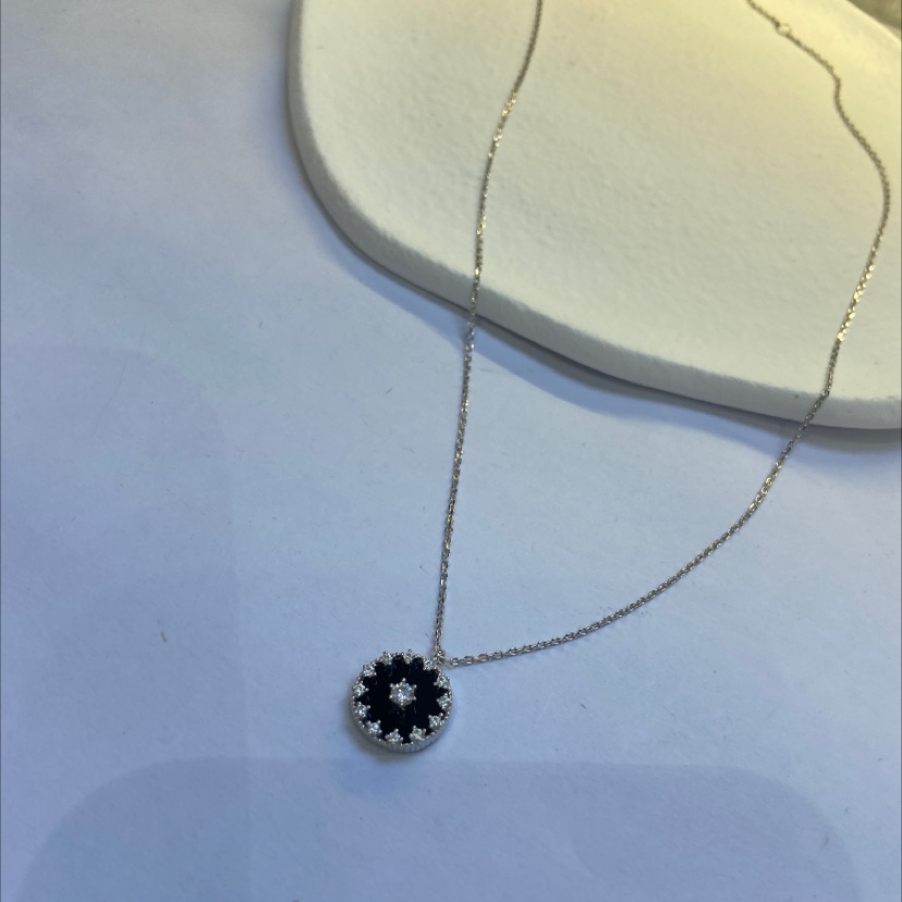 A small necklace made of black zircon slabs Specification image