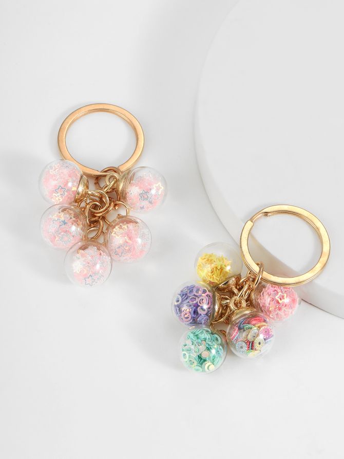 义乌市严凡工艺品7951店面男女同款钥匙扣挂包扣闪光泡泡球钥匙扣