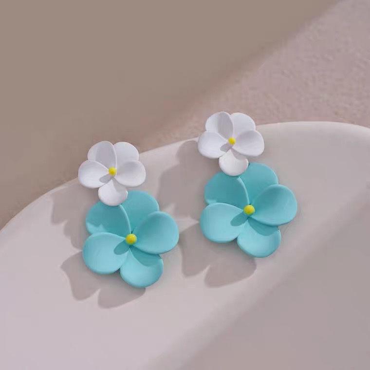 The unique design of the double flower stud earrings and the blue and green flower earrings exude a sense of sophistication. 2022 new trendy 1131 stylish earrings for women