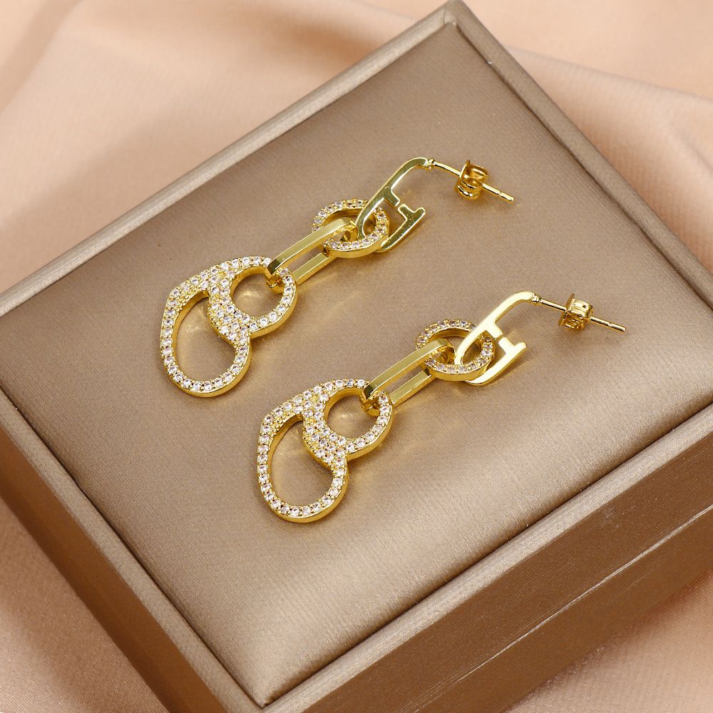 European and American cross-border style hollowed-out heart-shaped earrings, oval geometric micro-inlaid zircon full diamond earrings, ring earrings for women