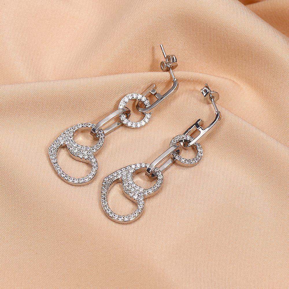 European and American cross-border style hollowed-out heart-shaped earrings, oval geometric micro-inlaid zircon full diamond earrings, ring earrings for women detail image 4