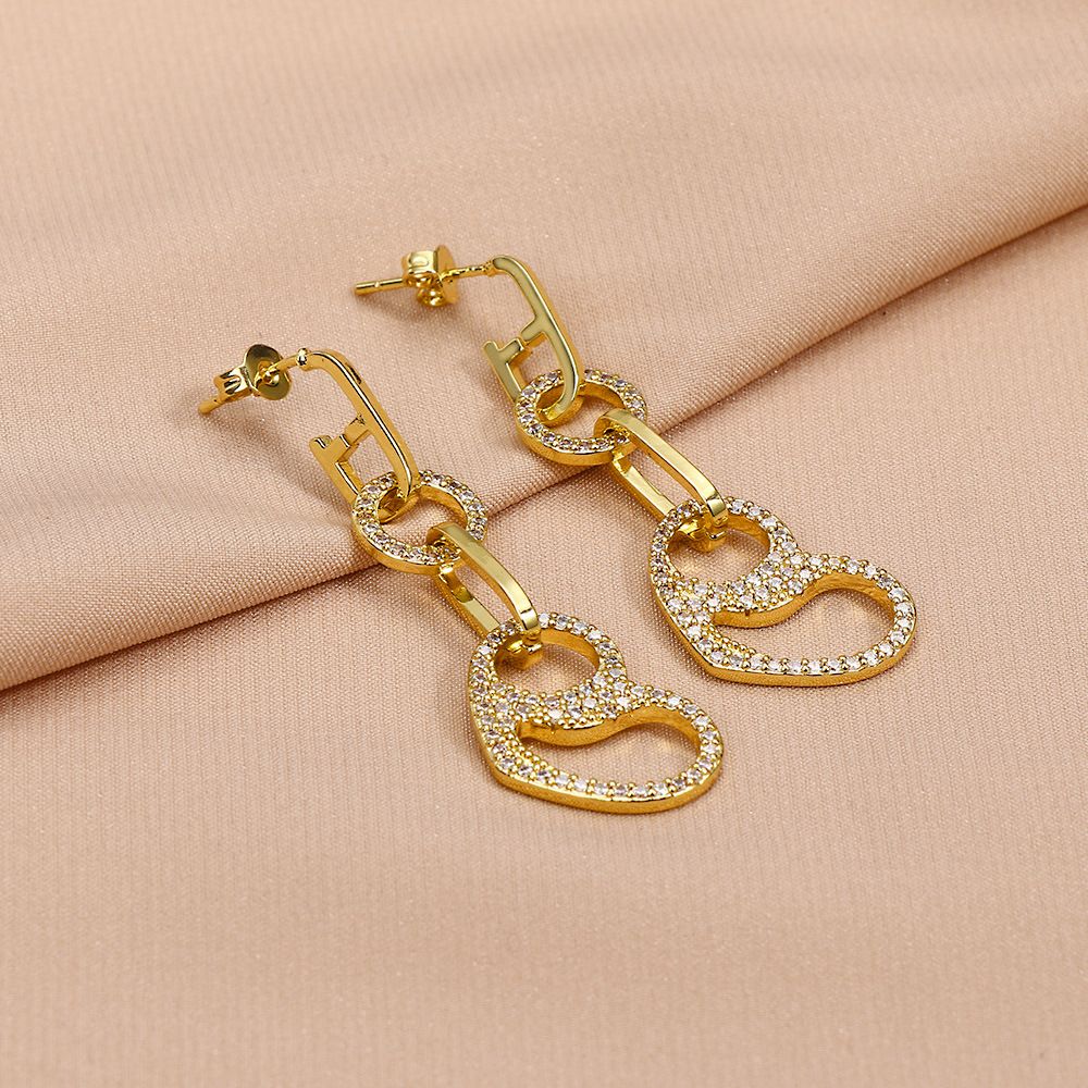 European and American cross-border style hollowed-out heart-shaped earrings, oval geometric micro-inlaid zircon full diamond earrings, ring earrings for women detail image 3
