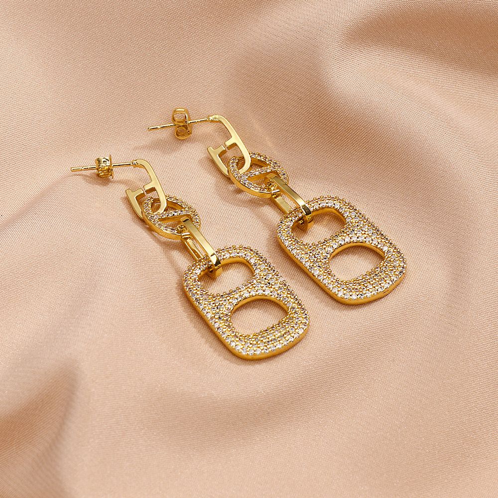 European and American cross-border style pig nose earrings, oval geometric micro-inlaid zircon exaggerated earrings, ring earrings, women's style Specification image