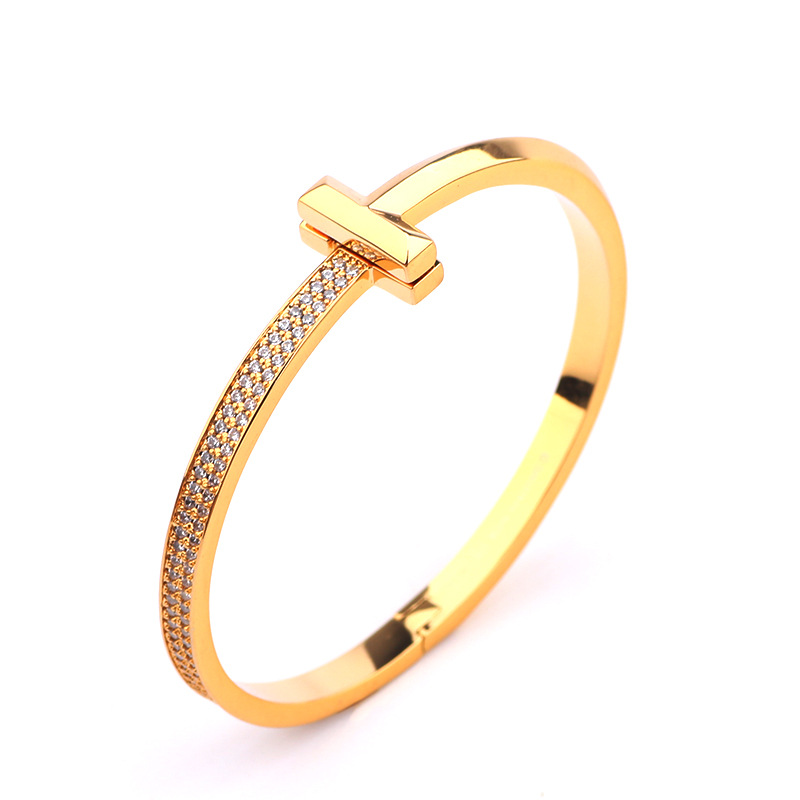 Creative gold-plated semi-inlaid double T bracelet, European and American fashion, versatile, light luxury women's style, slightly inlaid zircon wide version bracelet wholesale Specification image
