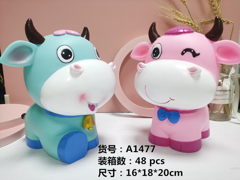 搪胶卡通情侣牛儿童存钱罐