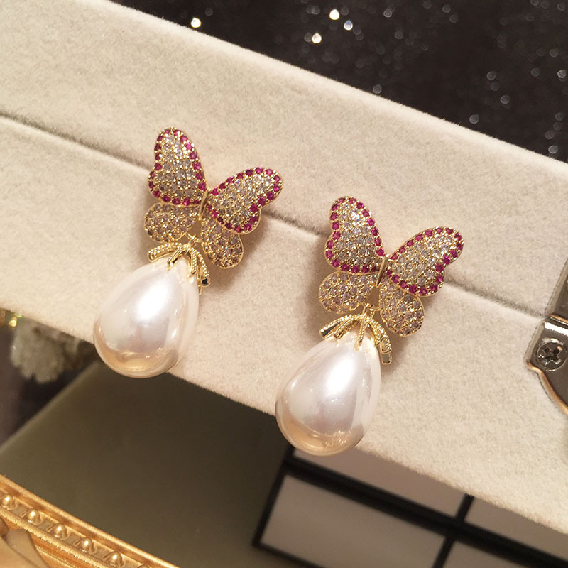 Butterfly pearl earrings, sweet and elegant, super fairy-like, exaggerated and trendy on Instagram. S925 silver needle long tassel earrings