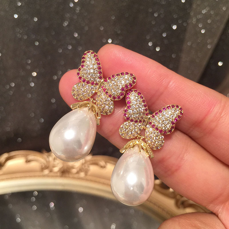 Butterfly pearl earrings, sweet and elegant, super fairy-like, exaggerated and trendy on Instagram. S925 silver needle long tassel earrings detail image 3