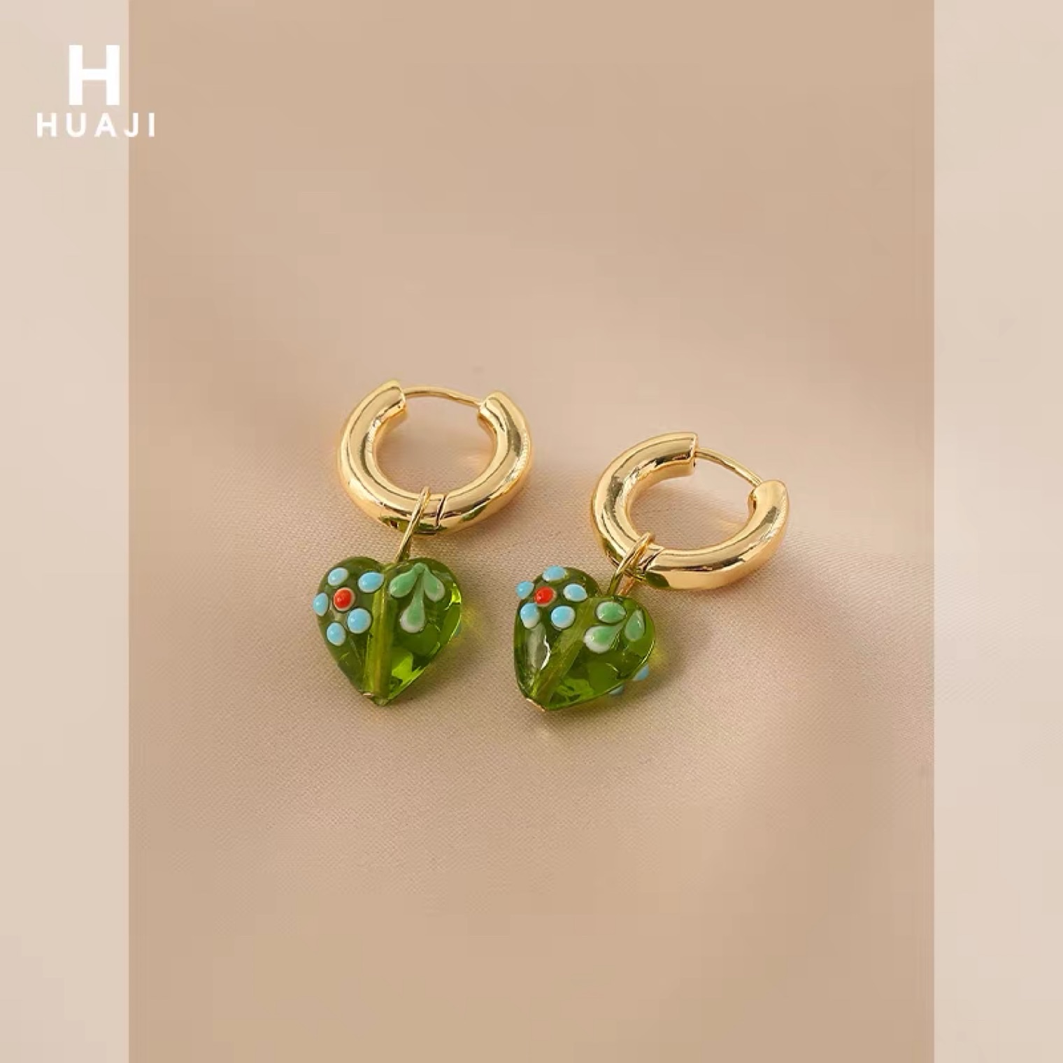 Flower Trace green heart-shaped earrings for women, 2022 new trendy design sense, niche ear buckles, this year's new model 084 unique earrings