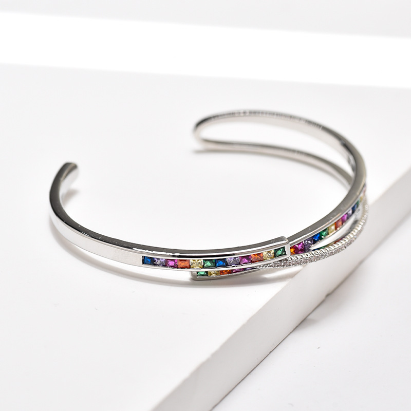 This unique European and American style bracelet with a hollowed-out design featuring colorful zircon and adjustable openings, is a popular gift for women Item Picture