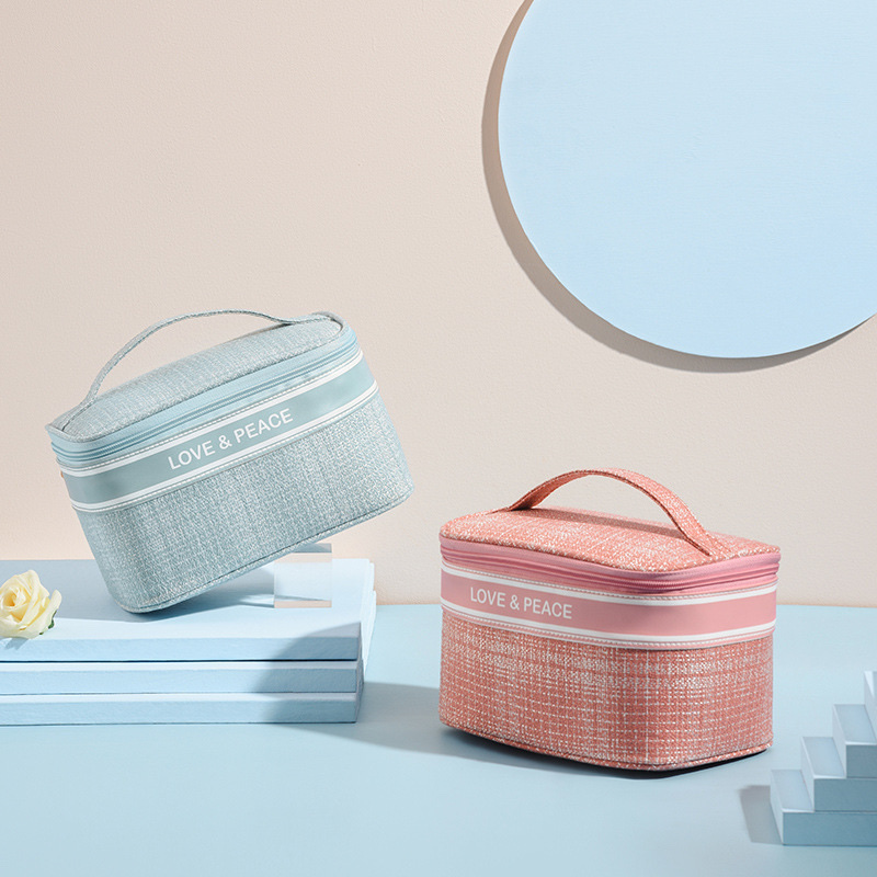 Xiaoxiangfeng series makeup bags, large-capacity hand-held makeup bags, cosmetics storage bags, makeup bag consignment details Picture