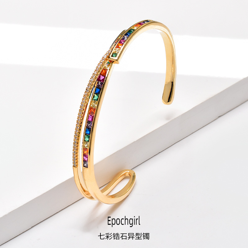 This unique European and American style bracelet with a hollowed-out design featuring colorful zircon and adjustable openings, is a popular gift for women