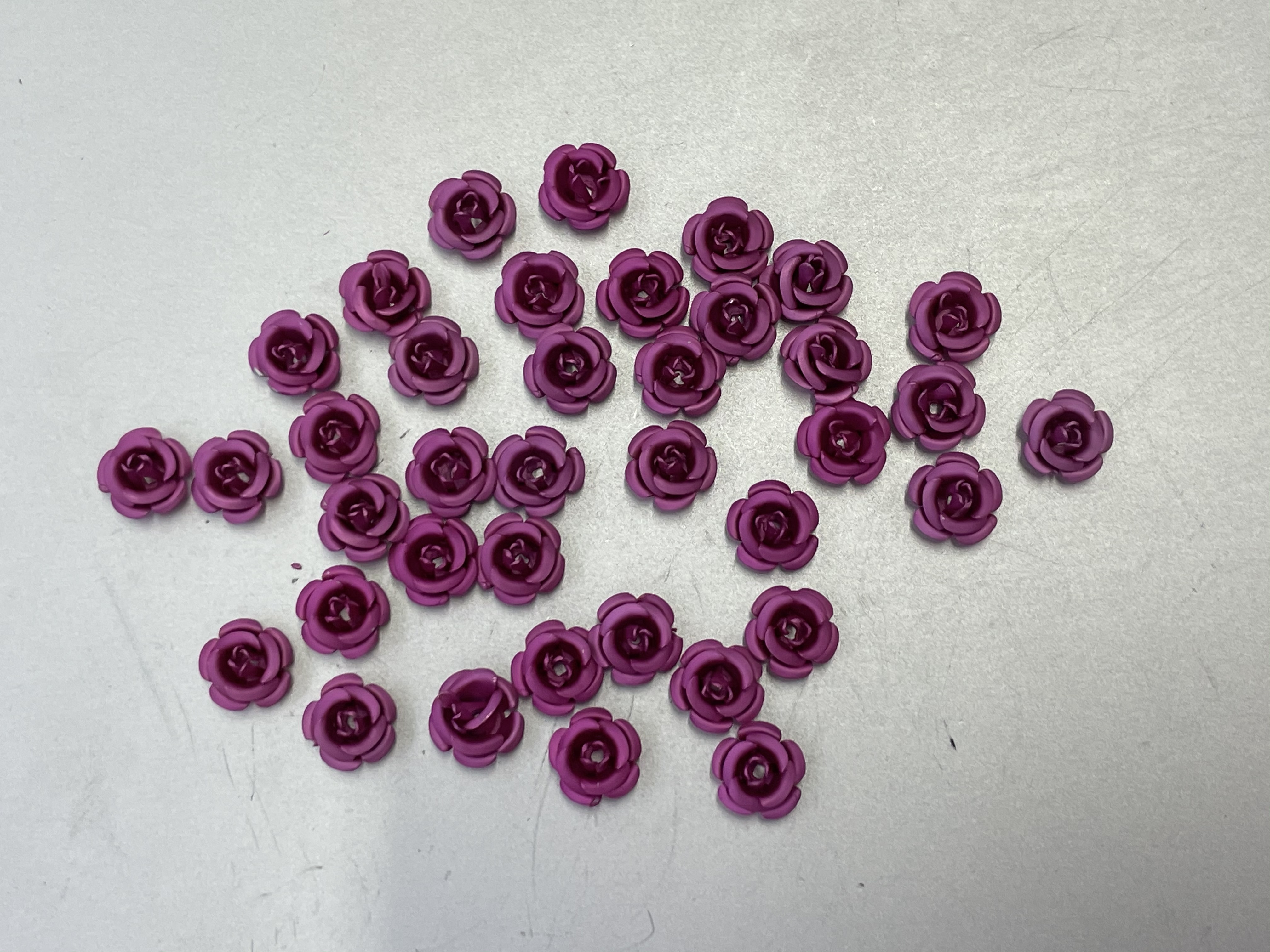 义乌国际商贸城一区三楼E区9街8885号8mm五瓣玫瑰花20#色