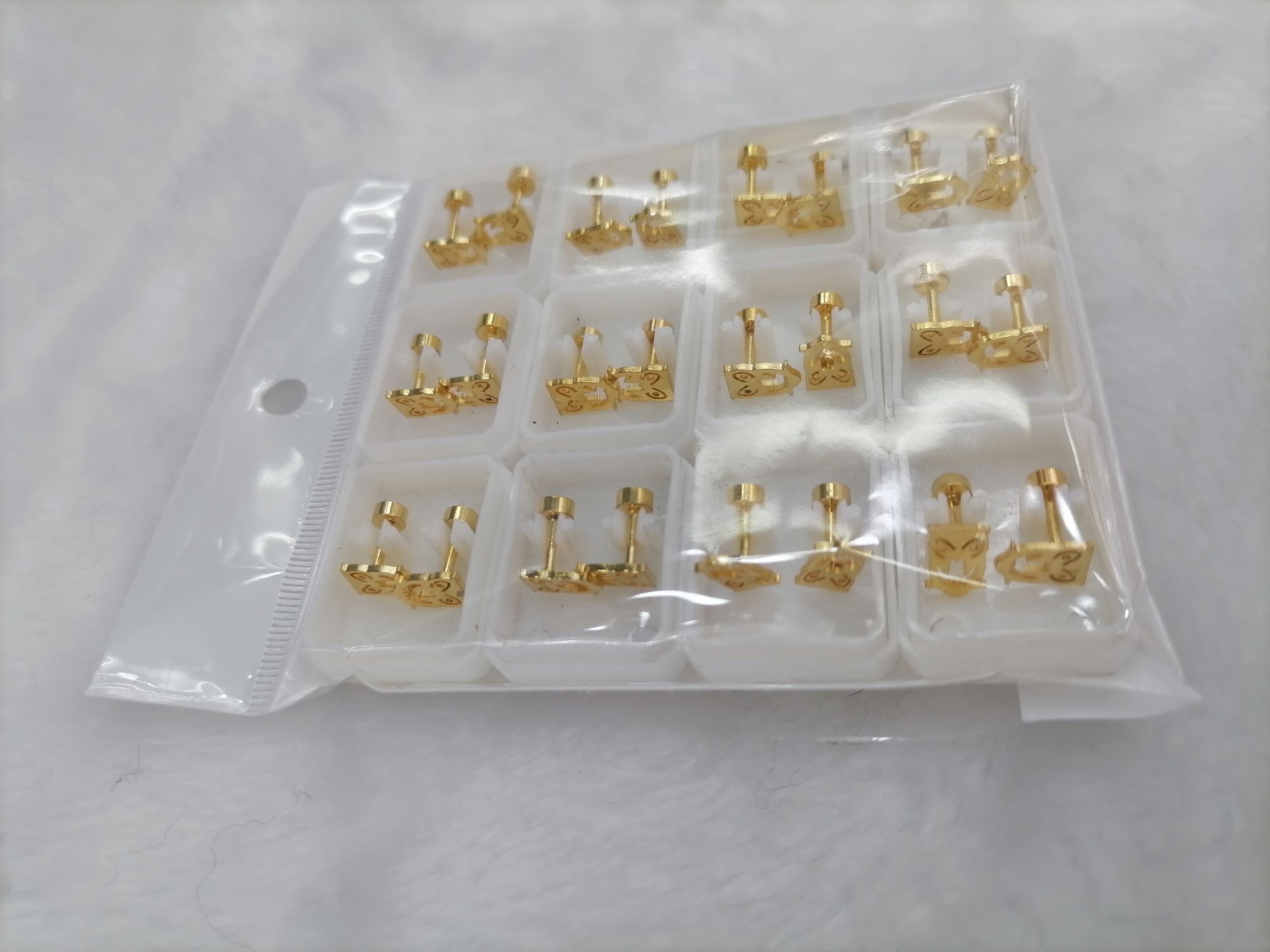 Titanium steel gold owl hollowed-out ear studs