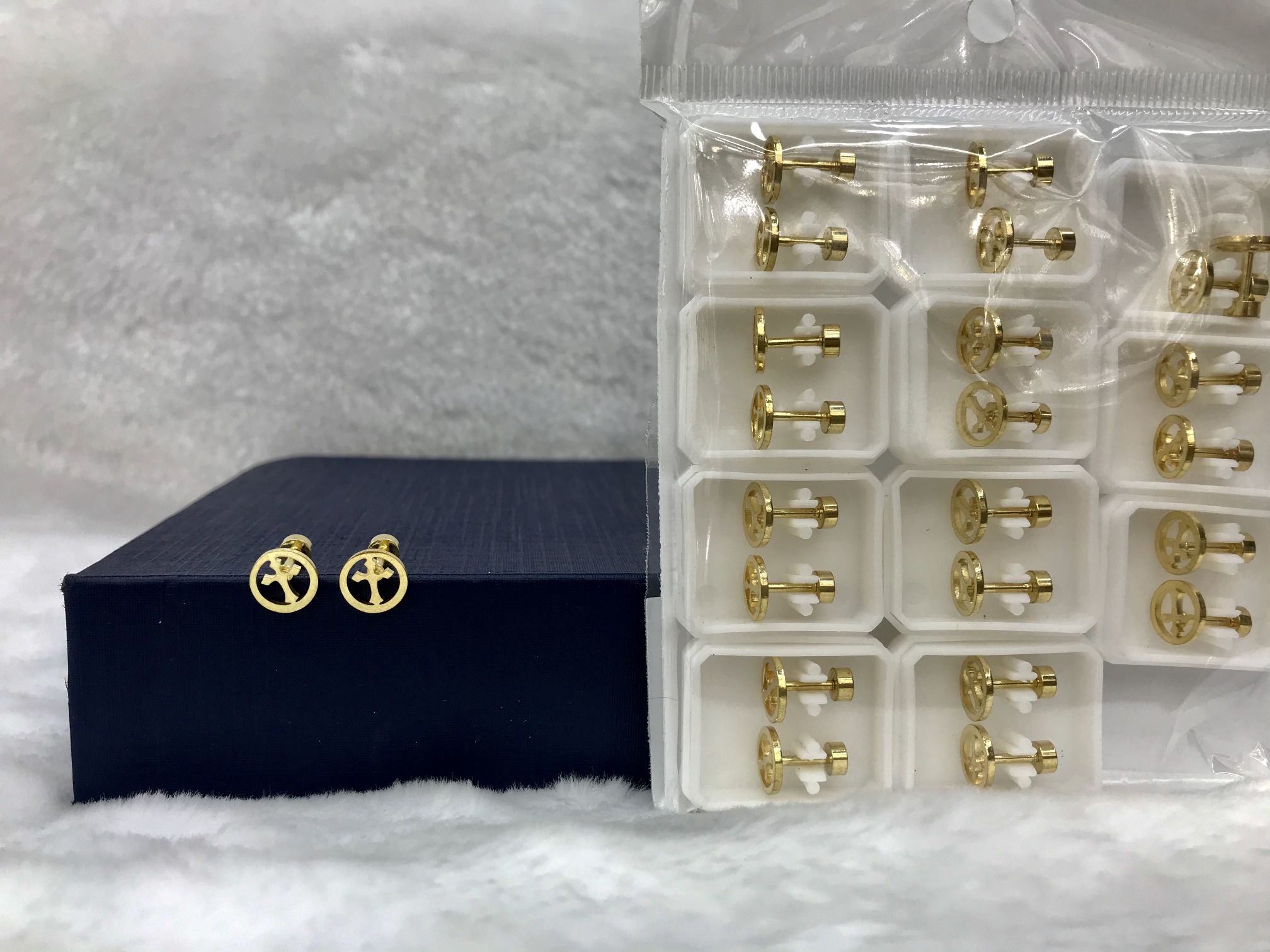 Titanium steel golden circular hollowed-out cross