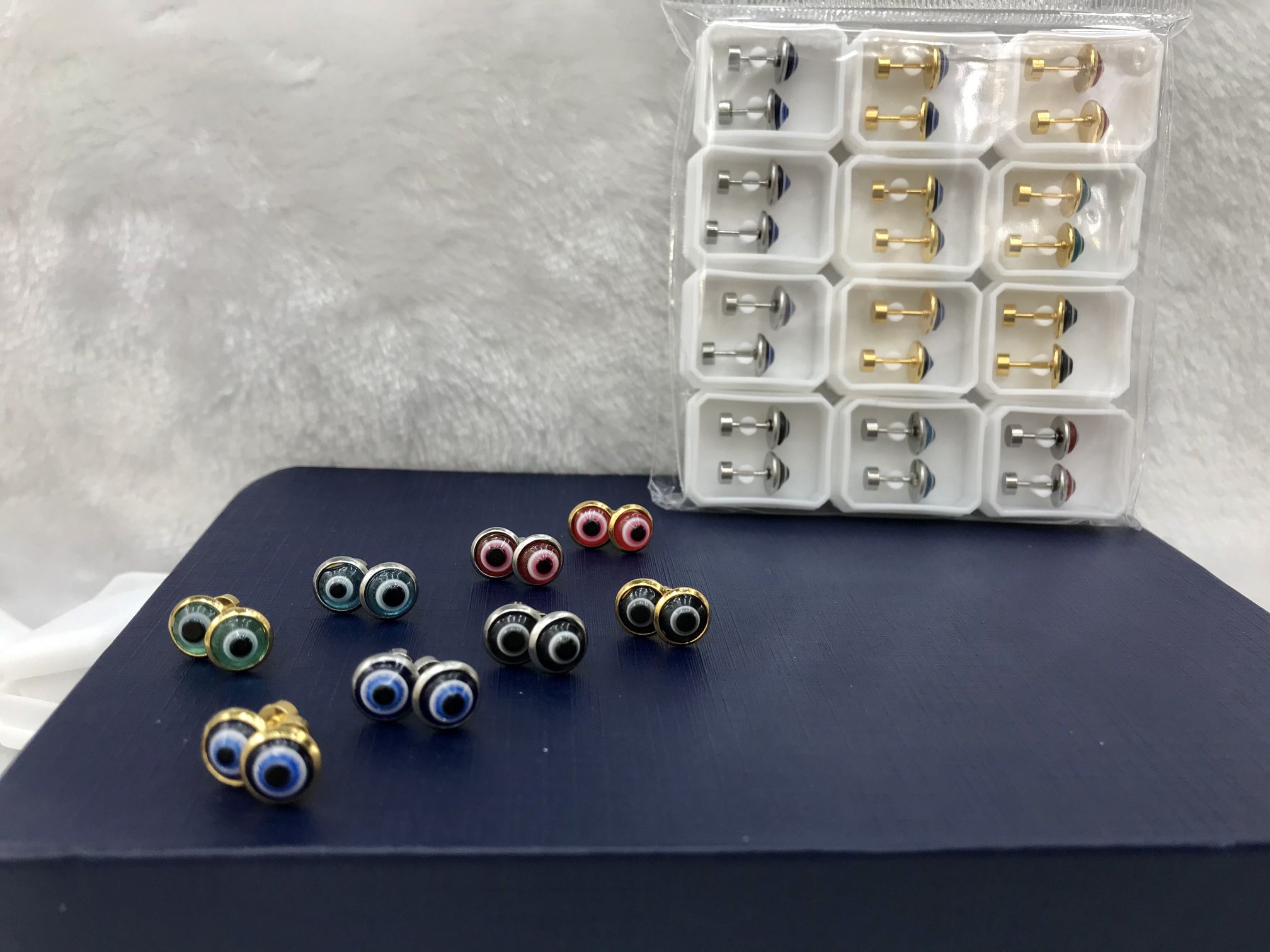 Titanium steel steel-colored eye oil drip earrings