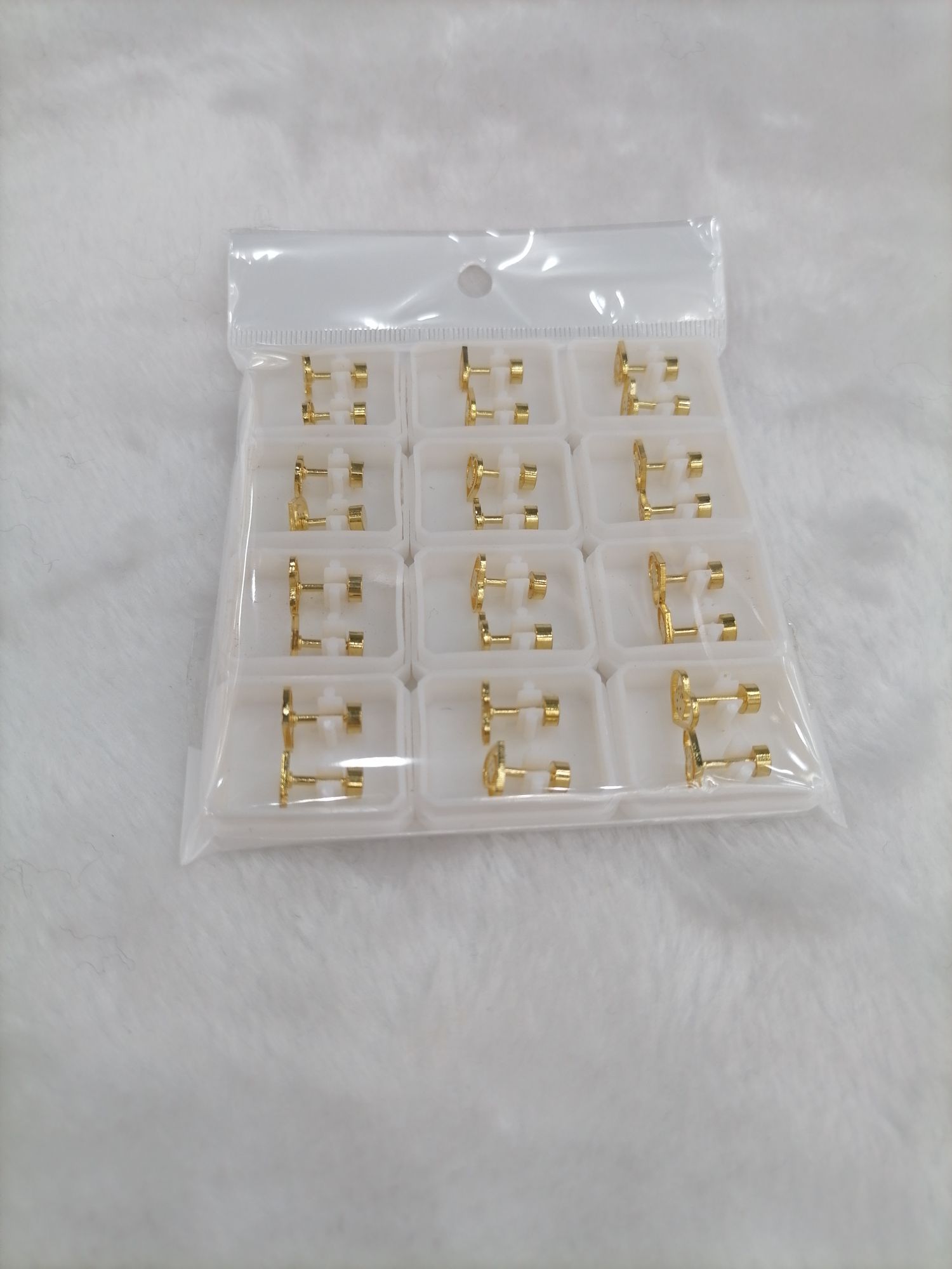 Titanium steel golden hollowed-out cat ear studs detail image 3