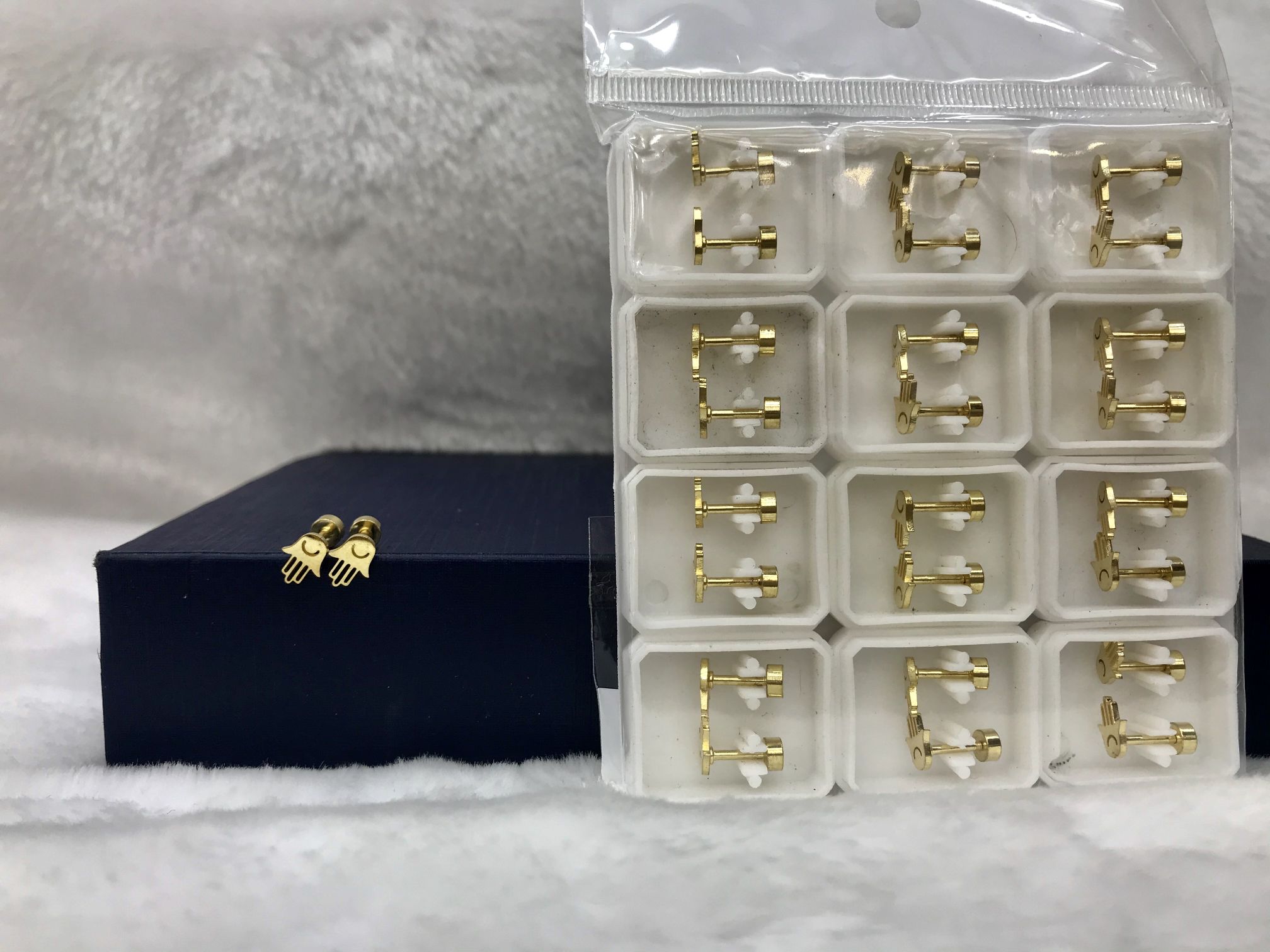 Titanium steel golden small hollowed-out ear studs