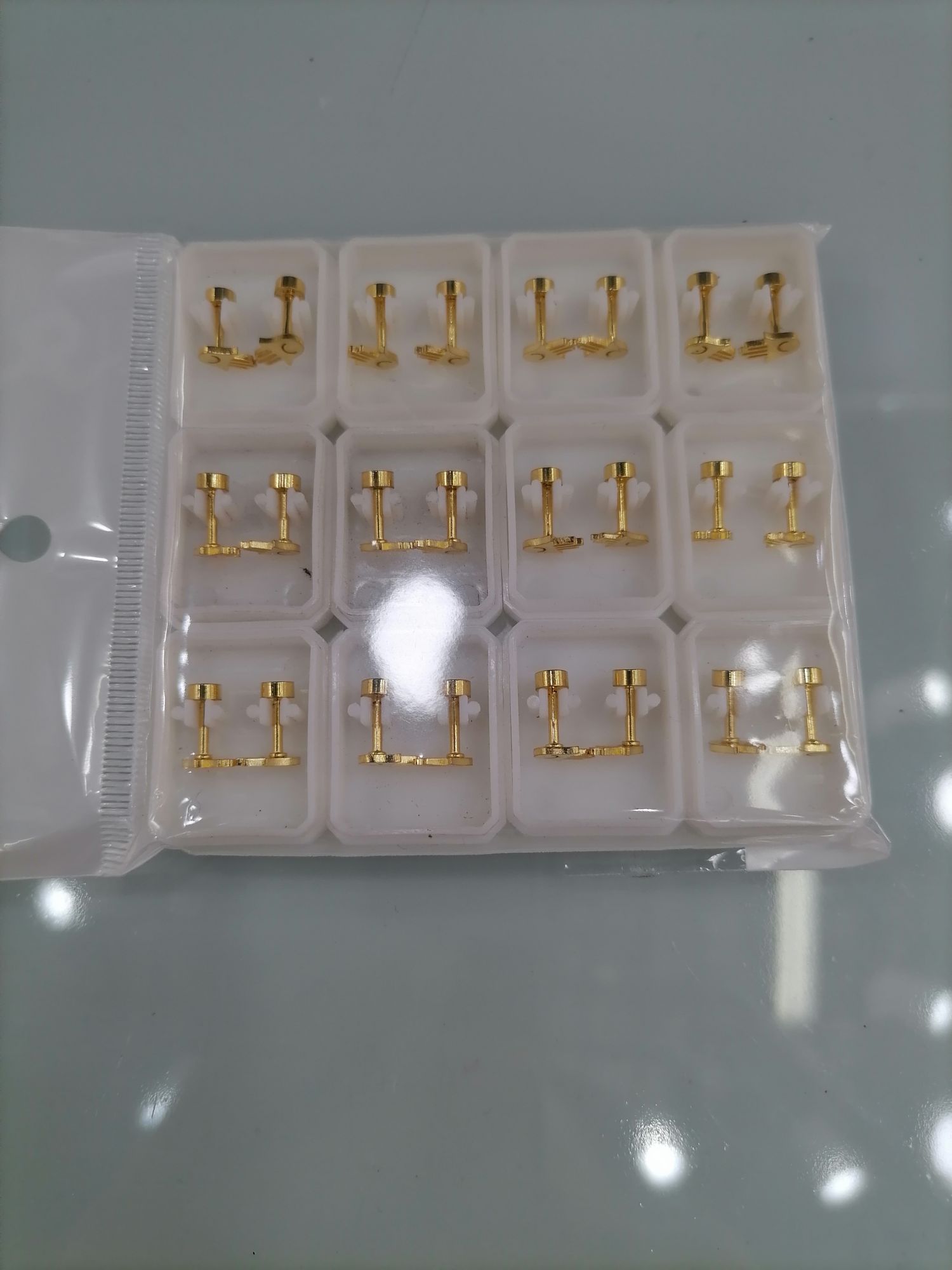 Titanium steel golden small hollowed-out ear studs Specification image