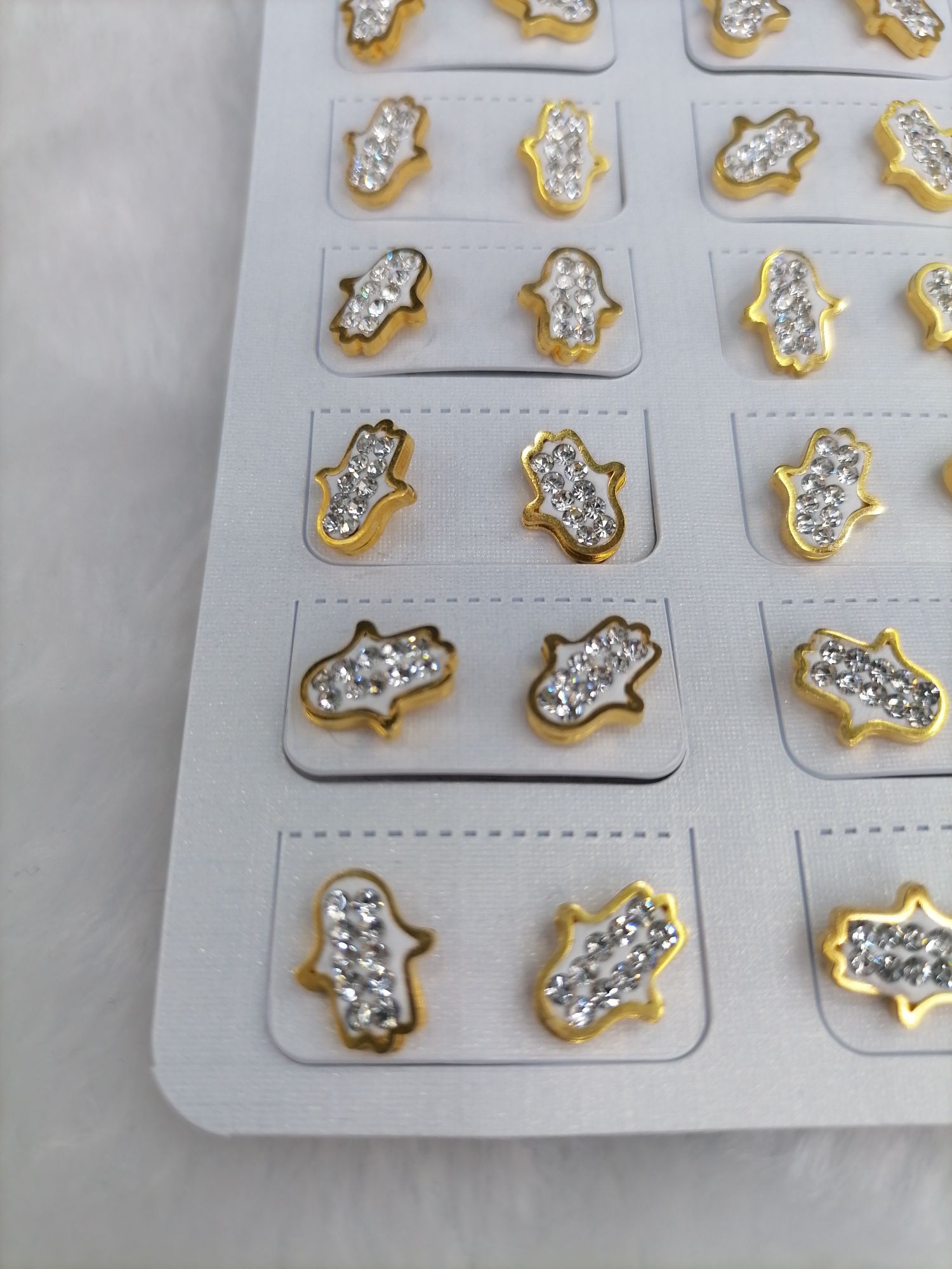 Titanium steel golden small hand with drill ear studs detail image 3
