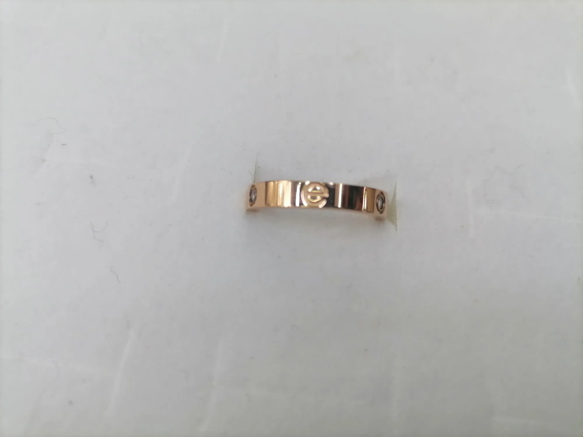 Titanium steel rose gold E-shaped diamond ring detail image 3