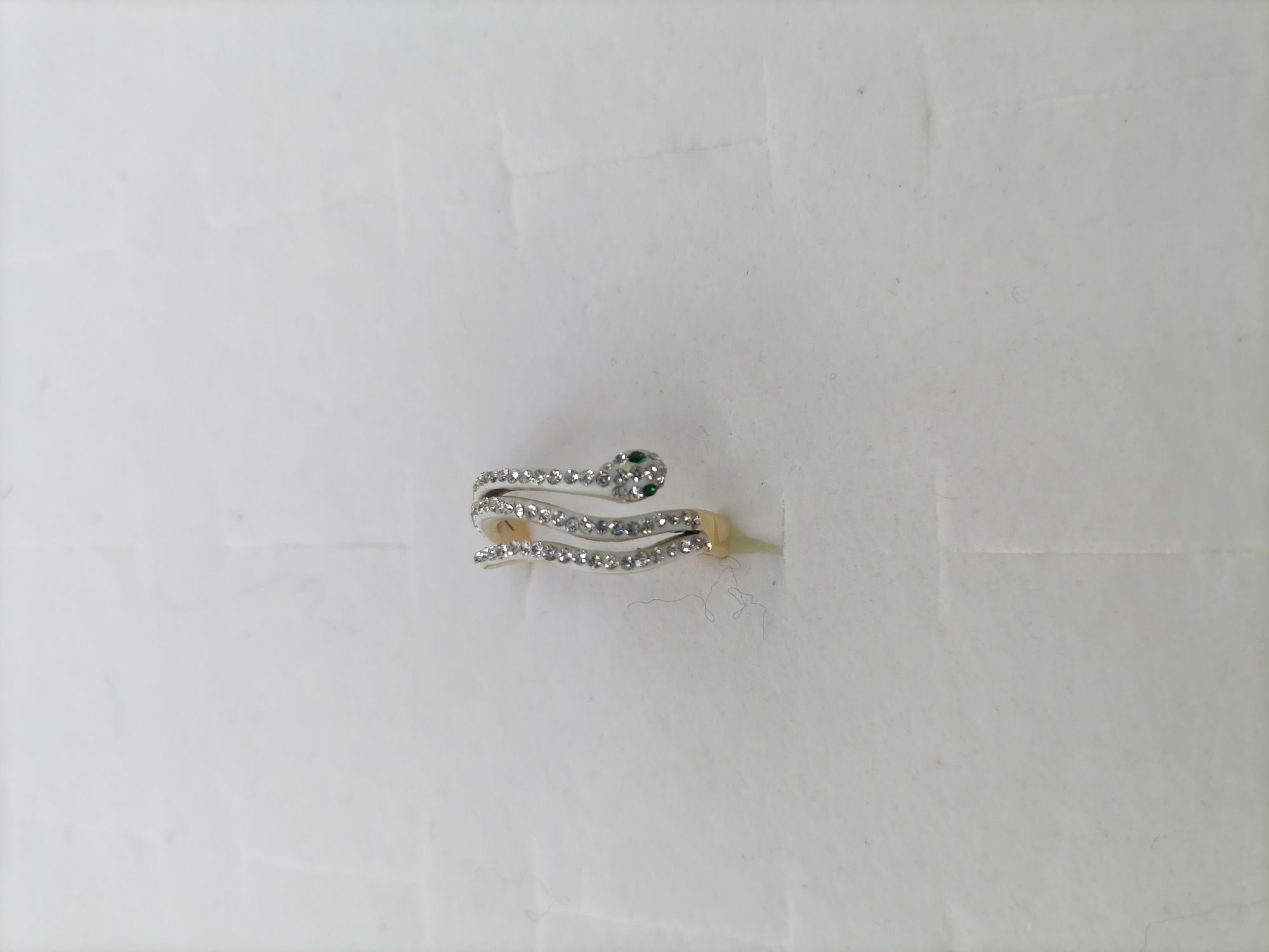 Titanium steel gold three-row snake green eye diamond ring