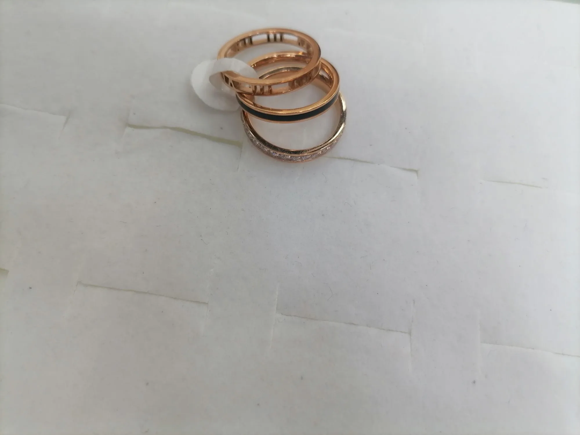 A set of three titanium steel rose gold rings with diamonds, oil drops, and retro clock hollowed-out rings detail image 3
