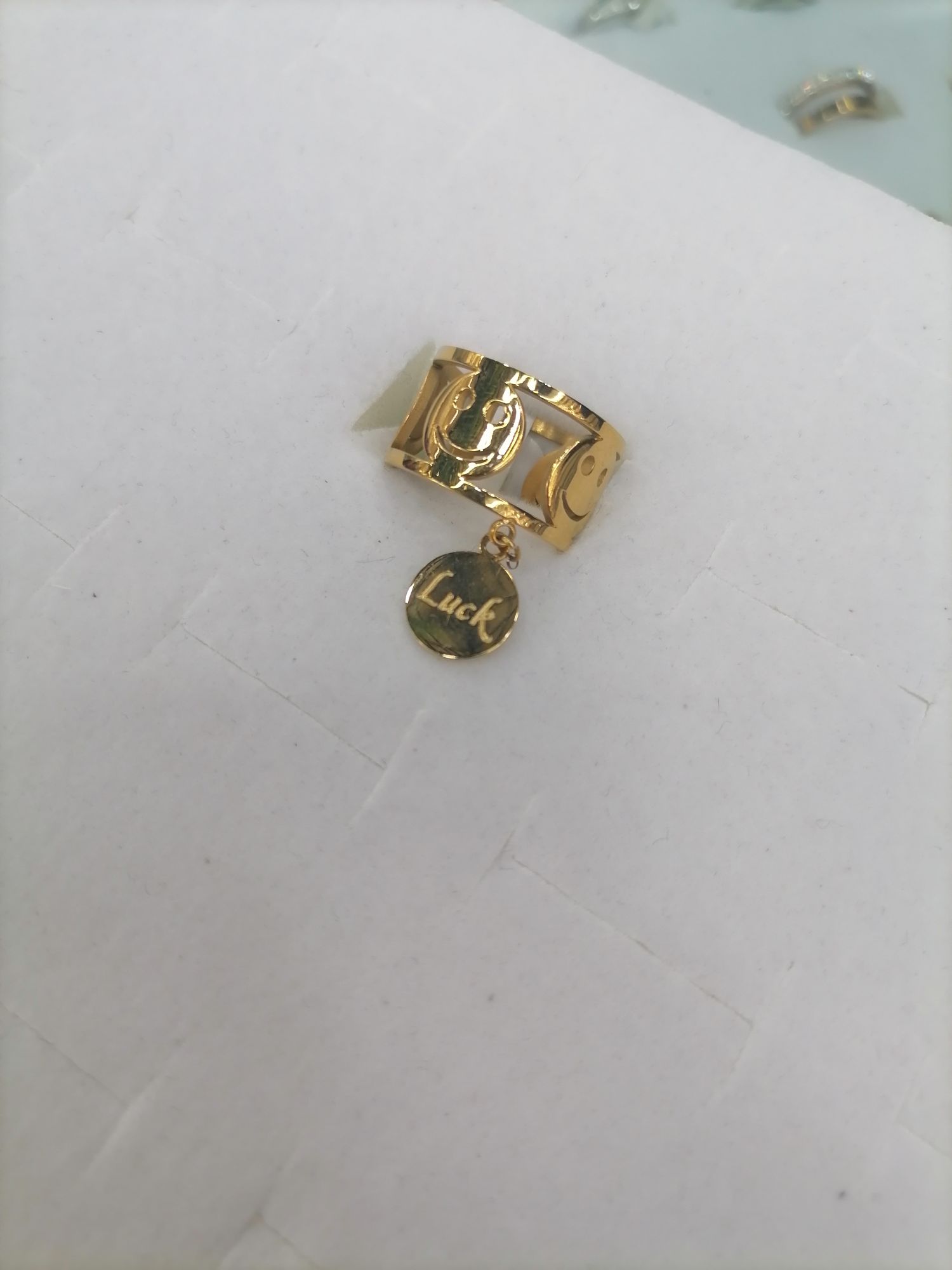 Titanium steel golden hollowed-out smiling face with luck pendant ring detail image 3