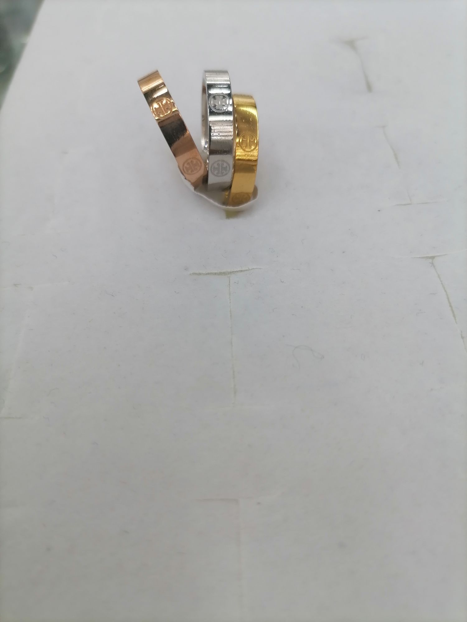 Titanium steel round T-patterned ring, available in three colors