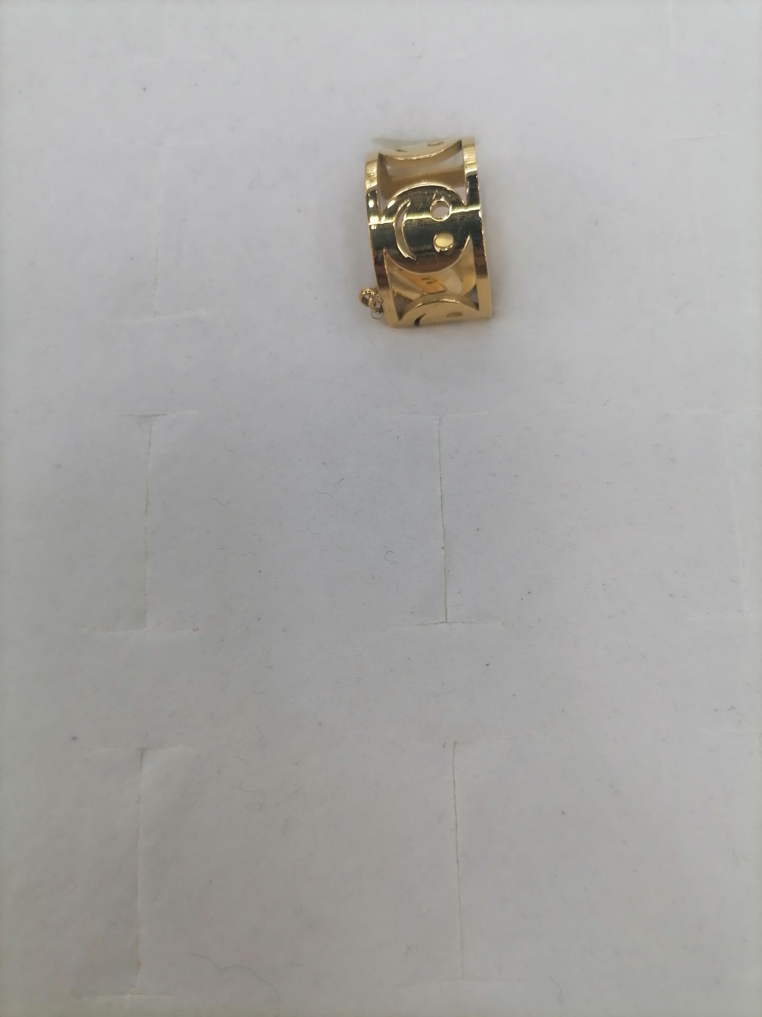 Titanium steel golden hollowed-out smiling face with luck pendant ring
