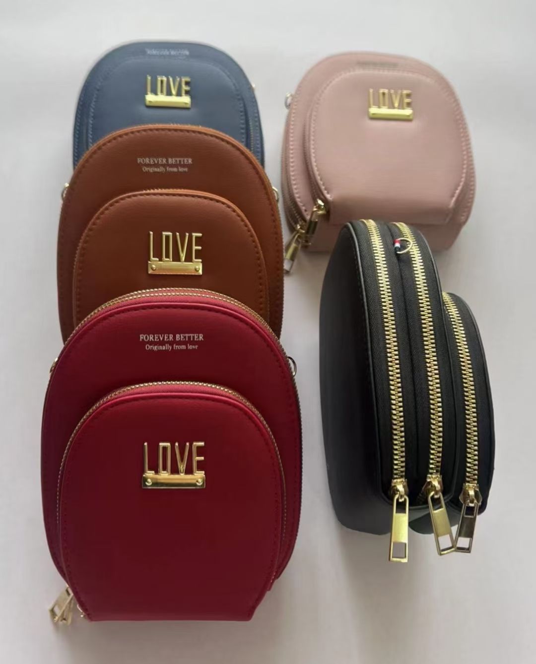 五色圆形三拉手机包