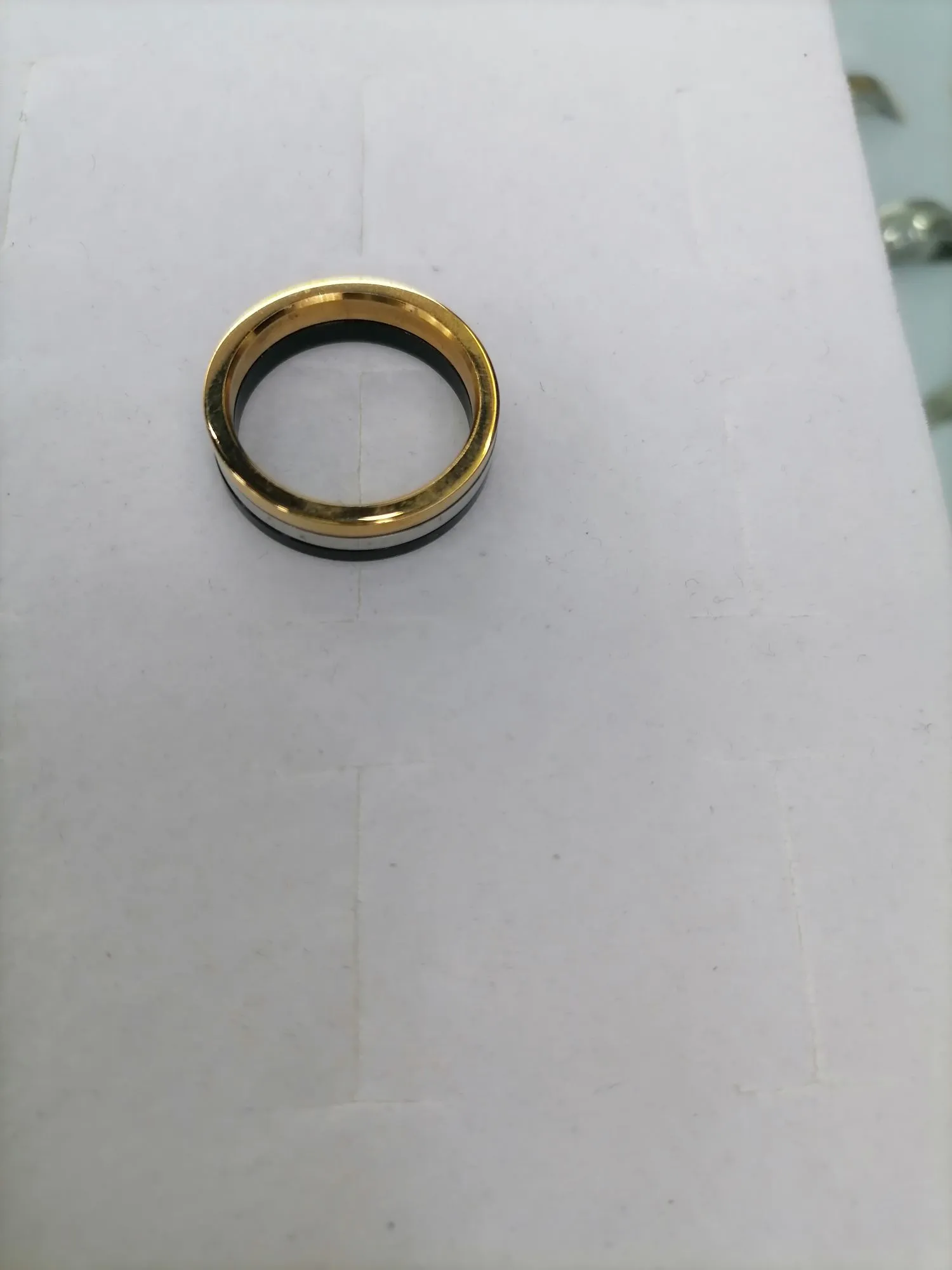 Titanium steel gradient gold with black sliding wheel design movable ring detail image 3