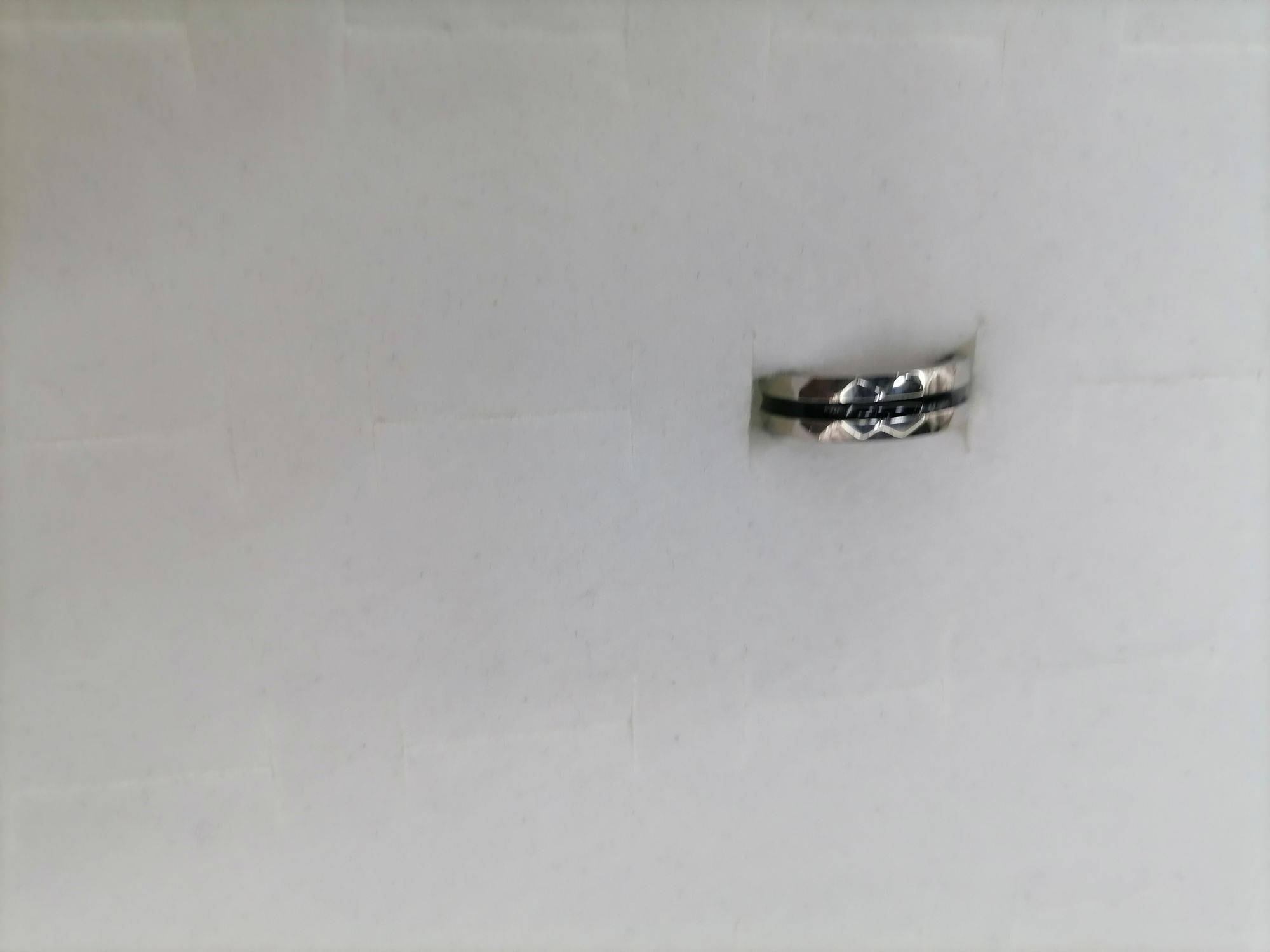 Titanium steel silver oil drip black outer double triangle design ring Specification image