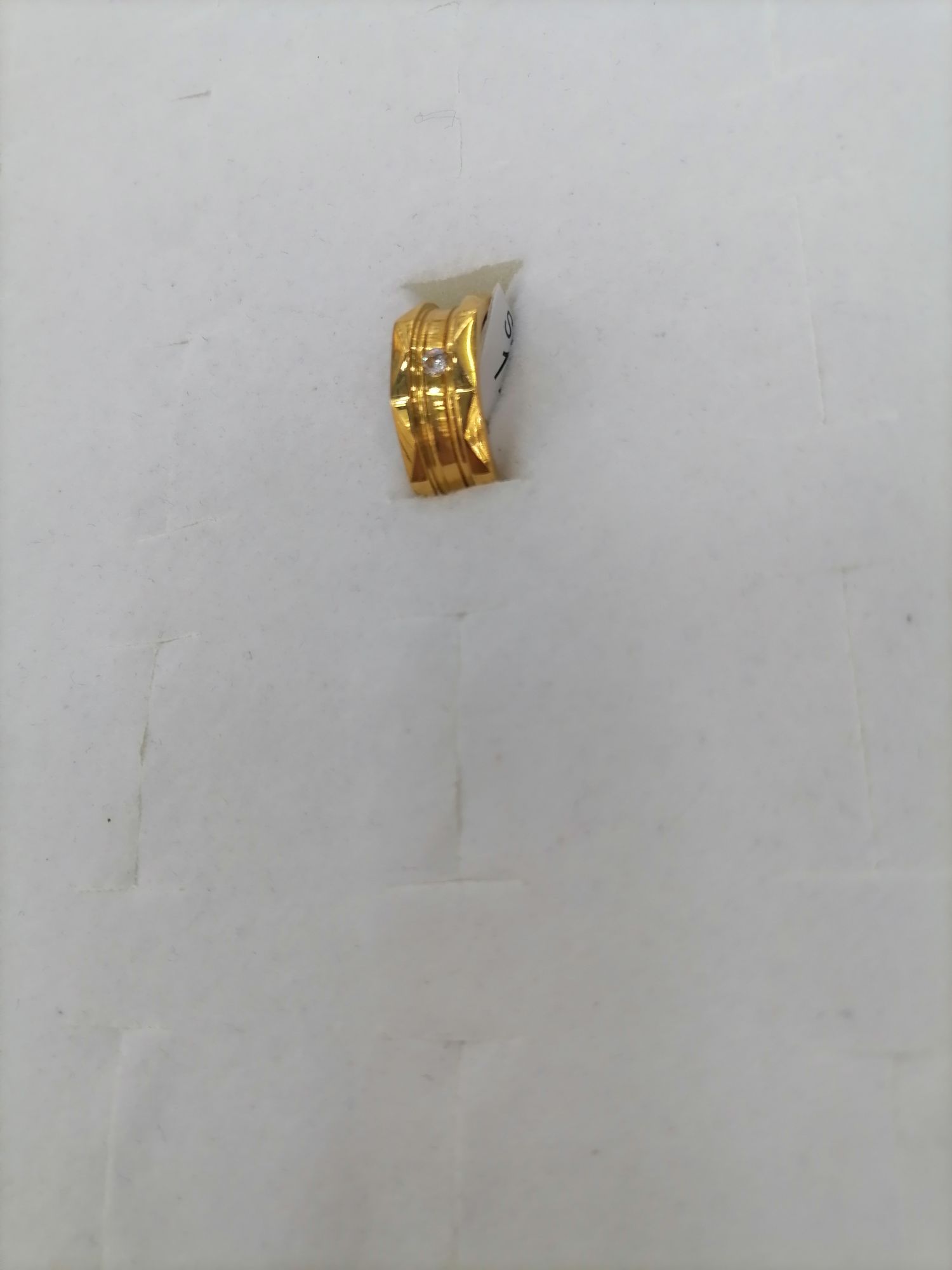The titanium steel gold diamond ring is designed with two right-angled triangles on the convex surface of the triangle and a concave ring detail image 2