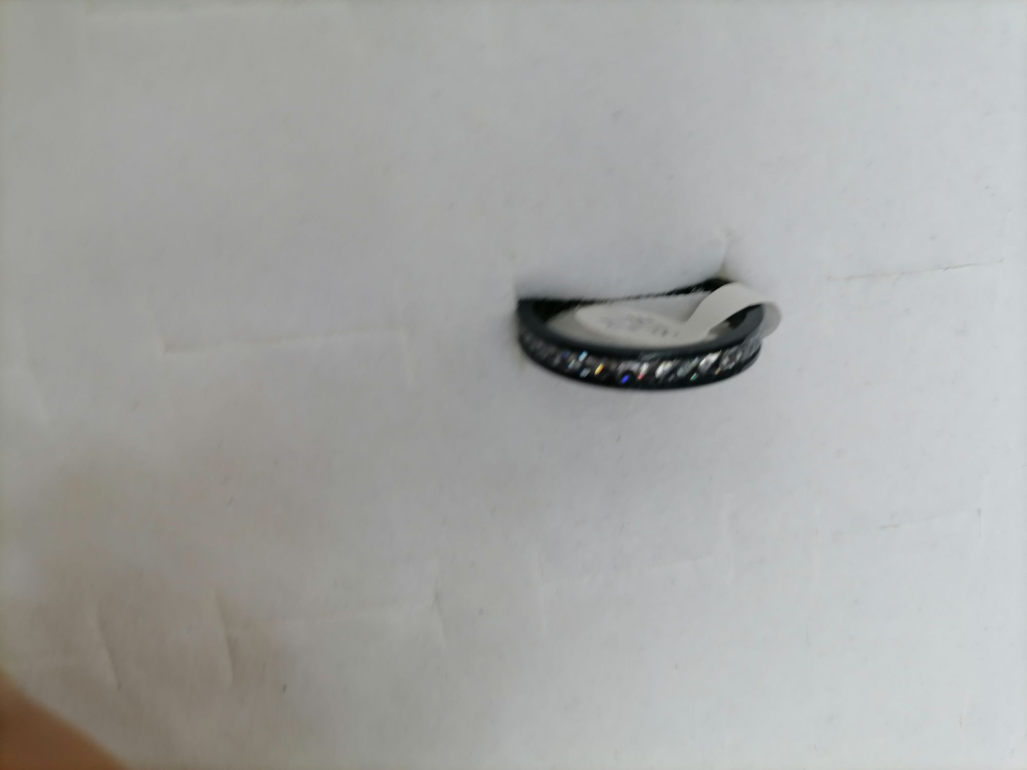A black titanium steel ring with a row of diamonds detail image 3