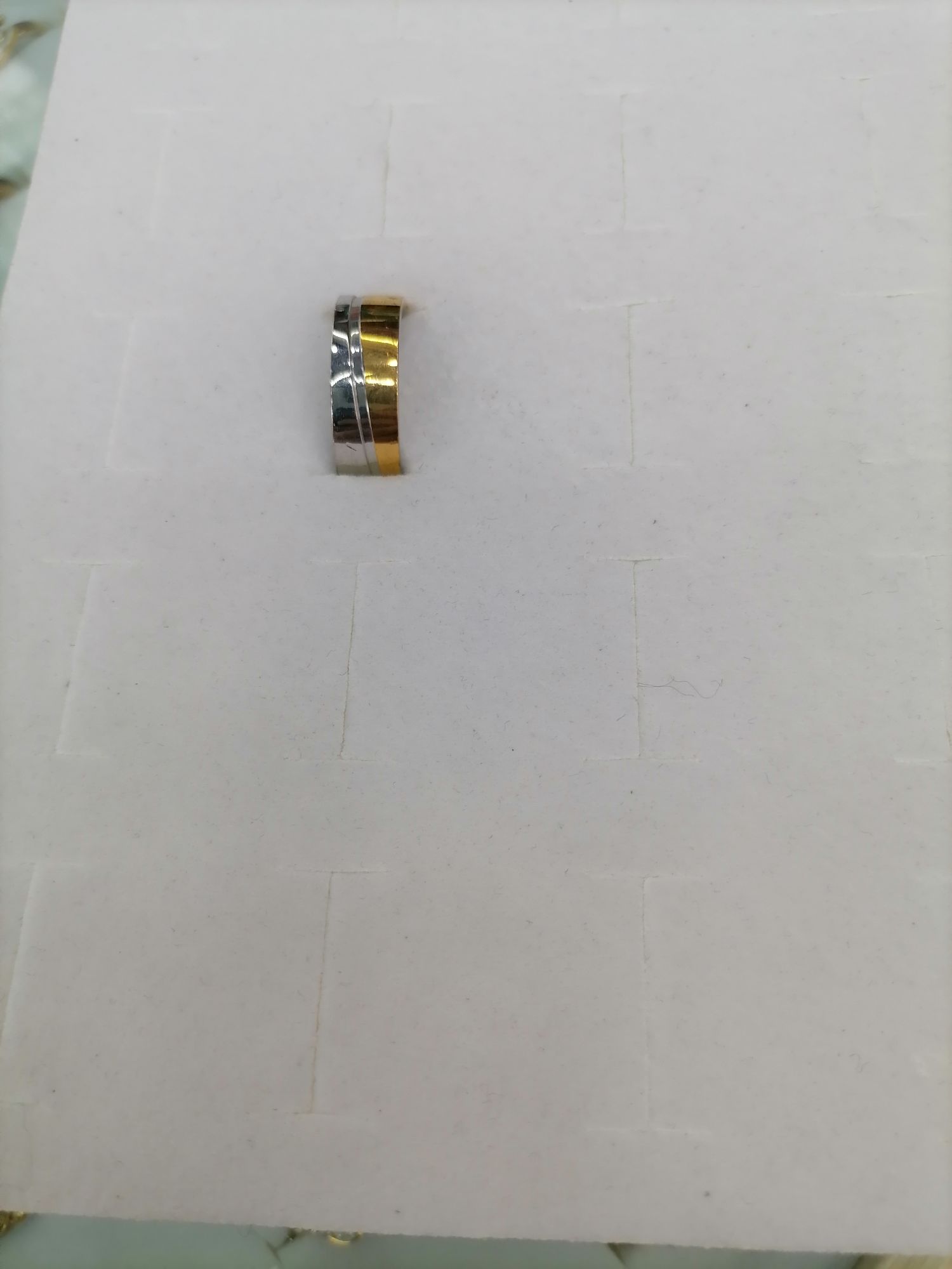 A titanium steel gradient gold concave design wavy ring