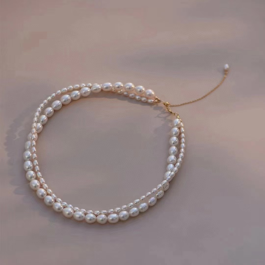 双层珍珠项链 
叠戴非常轻奢有质感 法式氛围感美女～
3-4mm➕7-8mm天然米形珍珠详情图1