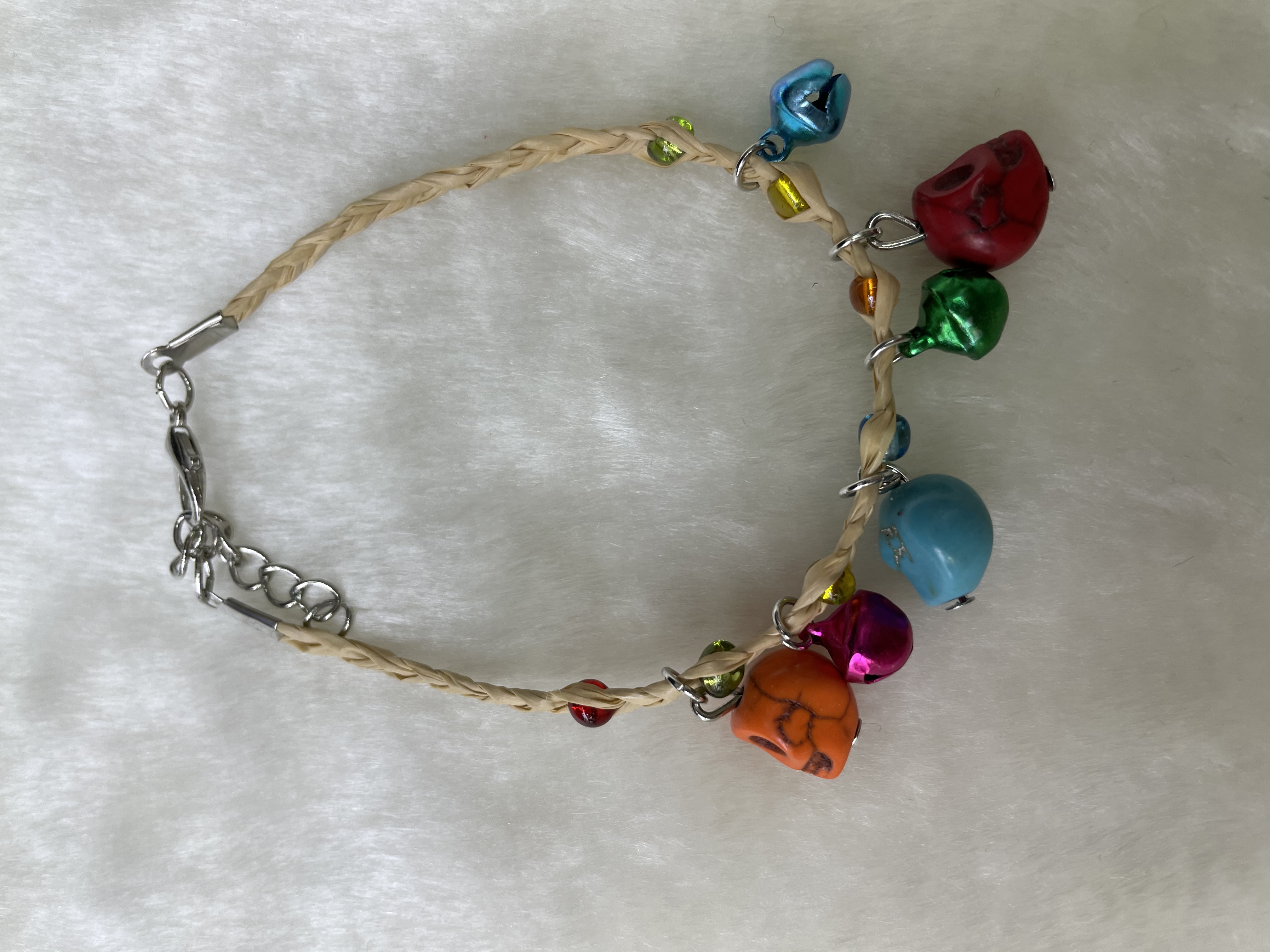 Seven-color bell and bone-head clover bracelet. Seven-color bell and bone-head clover bracelet