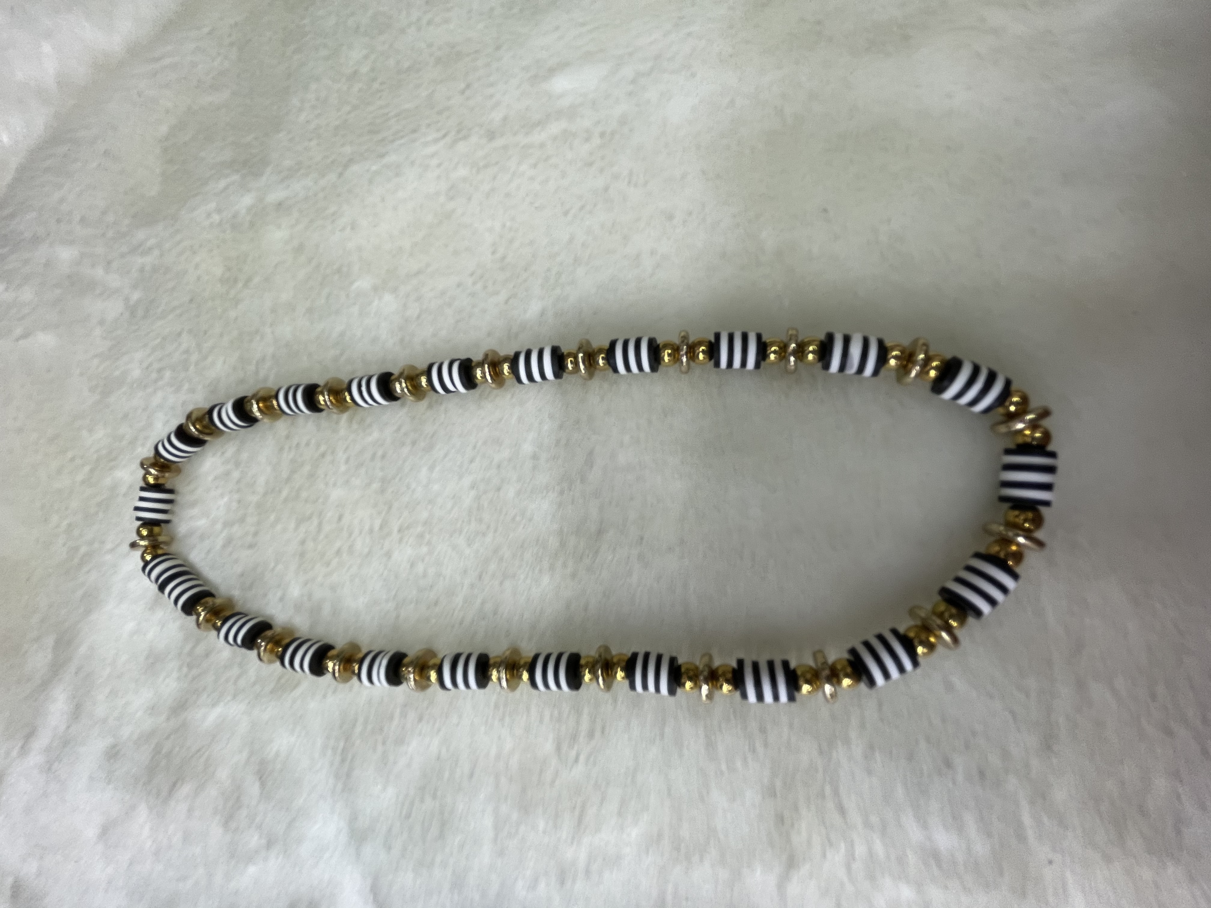 Soft black and white soft clay with gilded flat beads necklace soft black and white soft clay with gilded flat beads necklace Specification image
