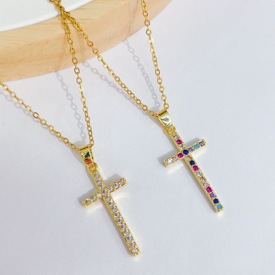 A new, simple and elegant design of a colorful cross necklace pendant with a unique and high-end collarbone chain for women