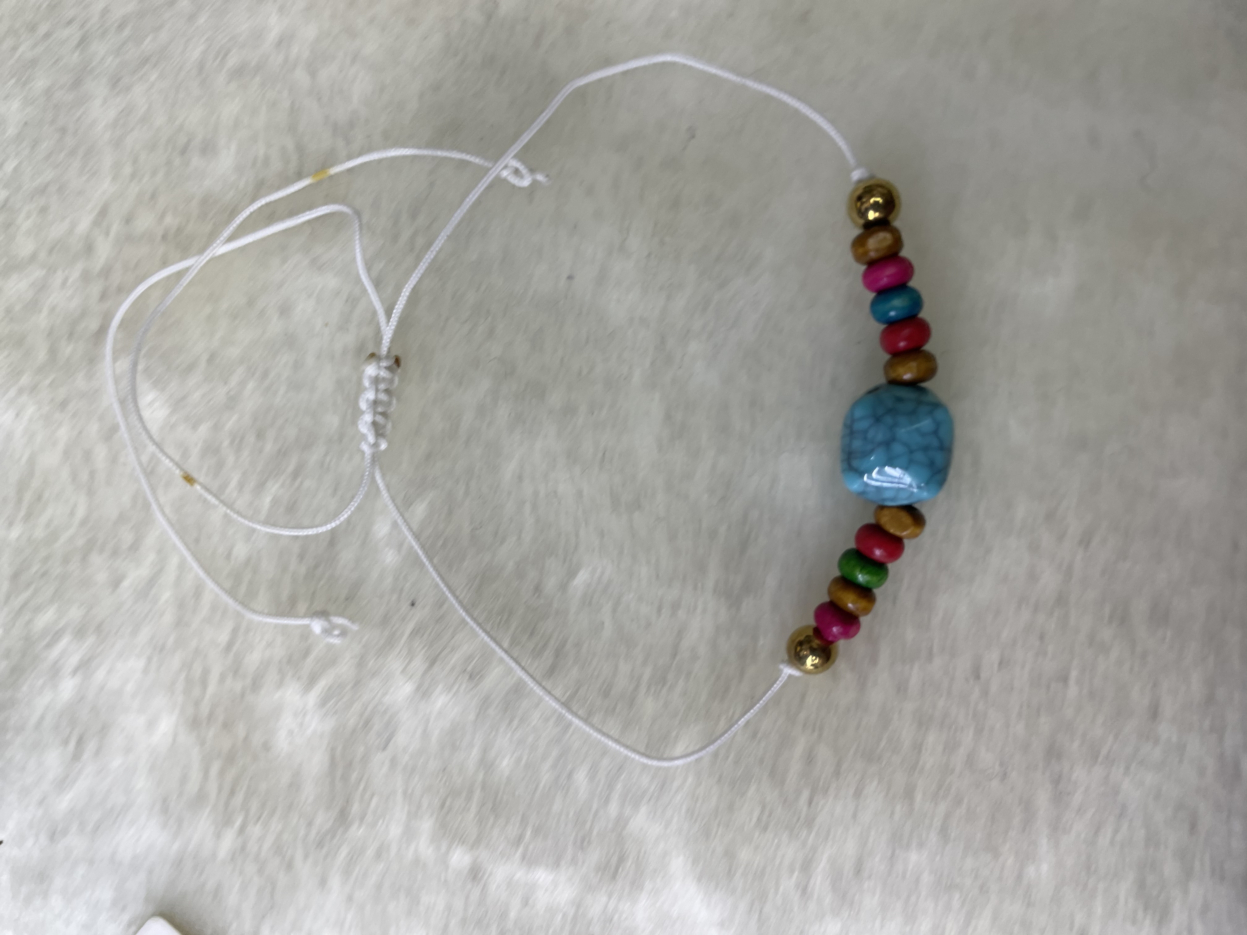 White string bracelet with seven-color wooden beads and square pine orchid beads details Picture