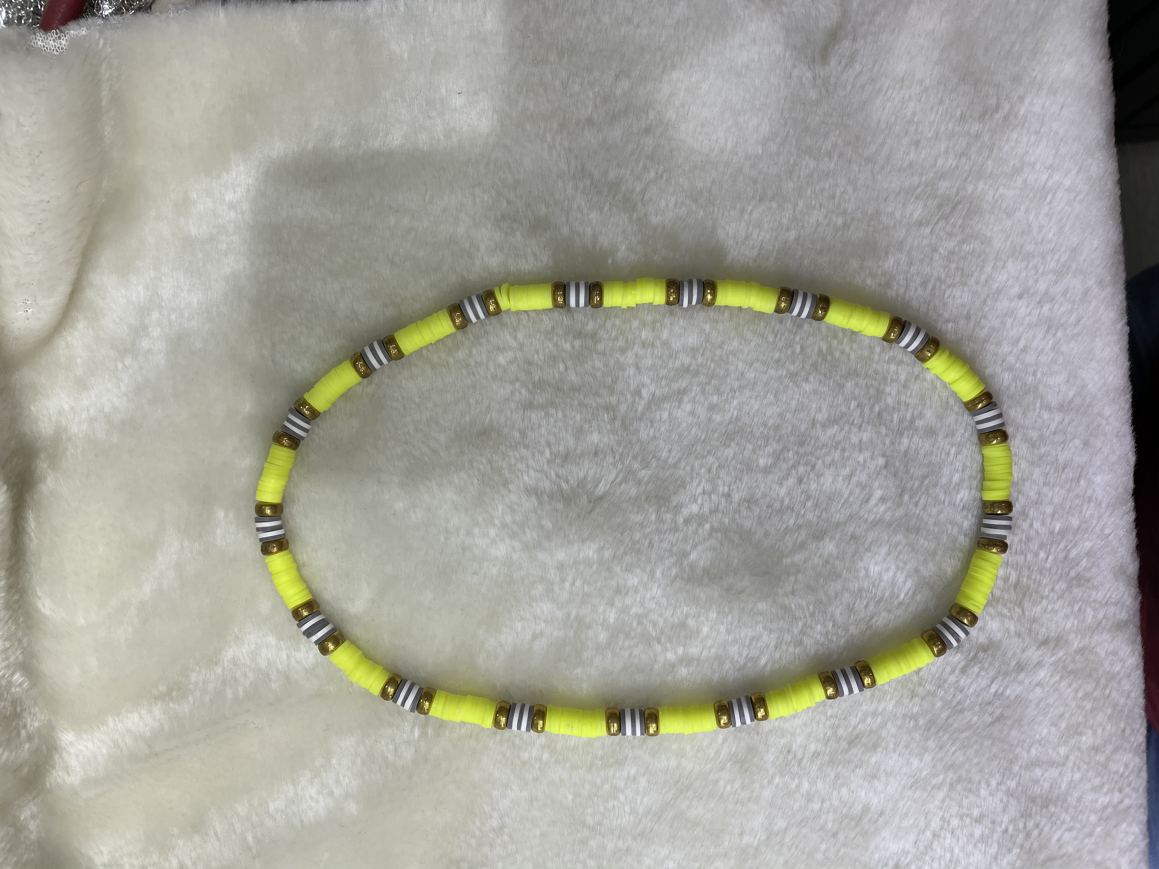Yellow soft ceramic shards with gilded flat beads necklace. Yellow soft ceramic shards with gilded flat beads necklace details Picture