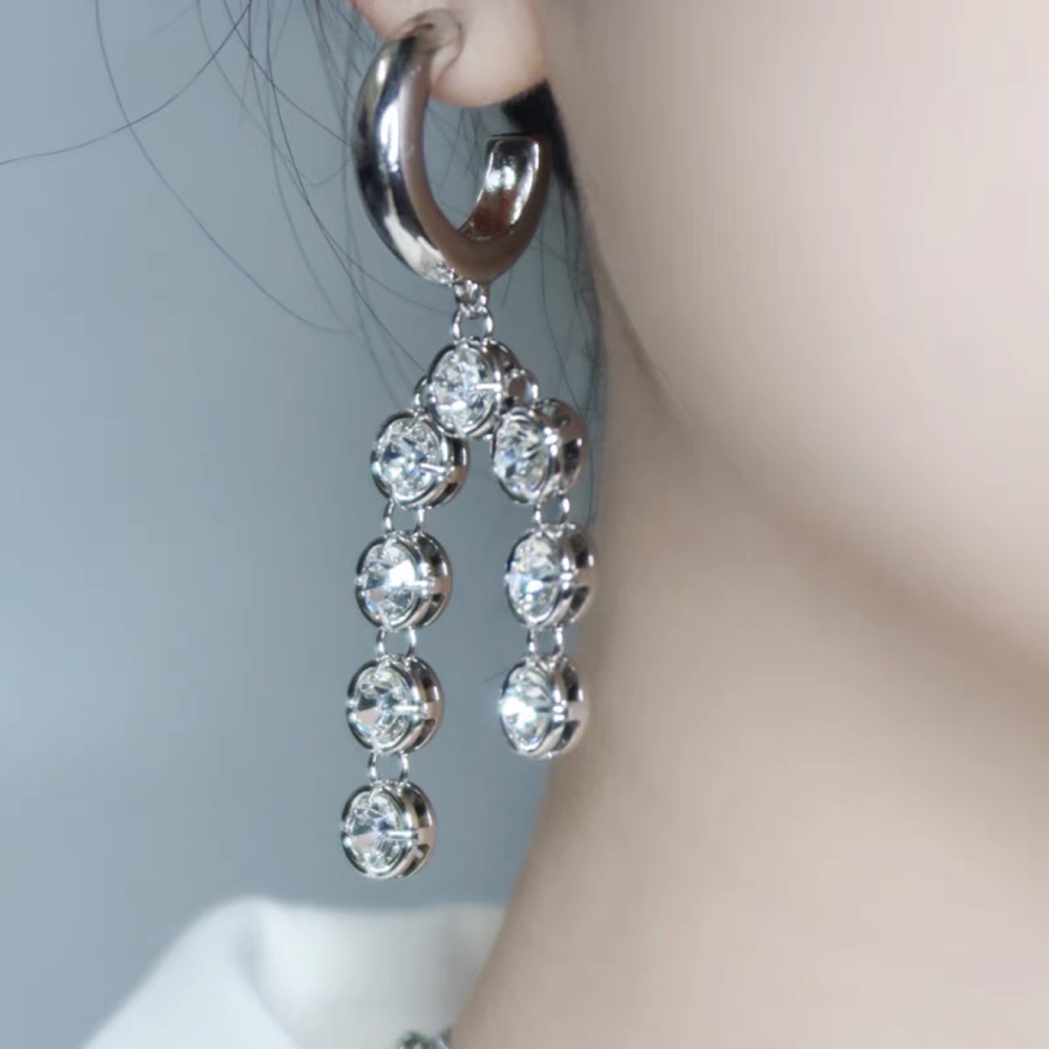 Summer new high-end and light luxury abyb earrings for women, the sound of snow falling, long Zircon 007 stud earrings, silver needles