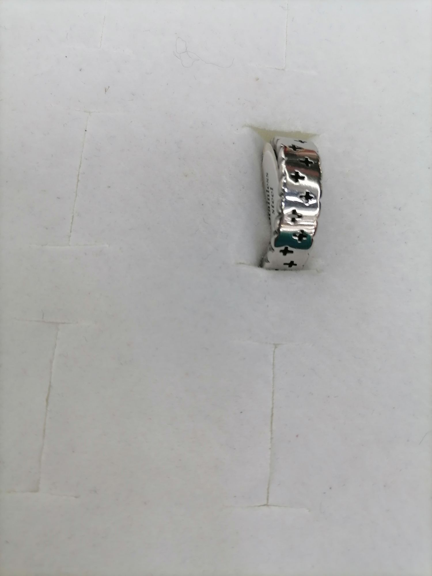 The titanium steel silver cross has a wide and thick pattern on the outside, making it a ring Specification image