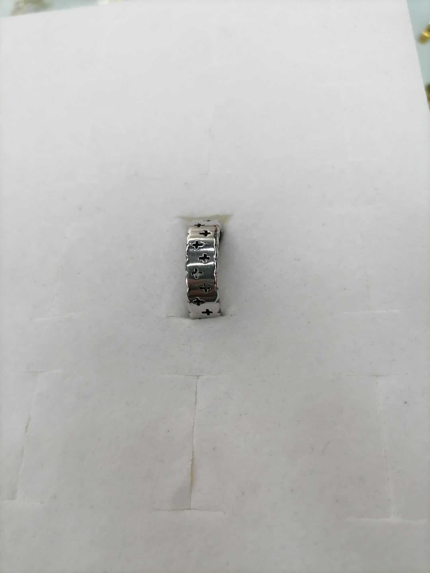 The titanium steel silver cross has a wide and thick pattern on the outside, making it a ring