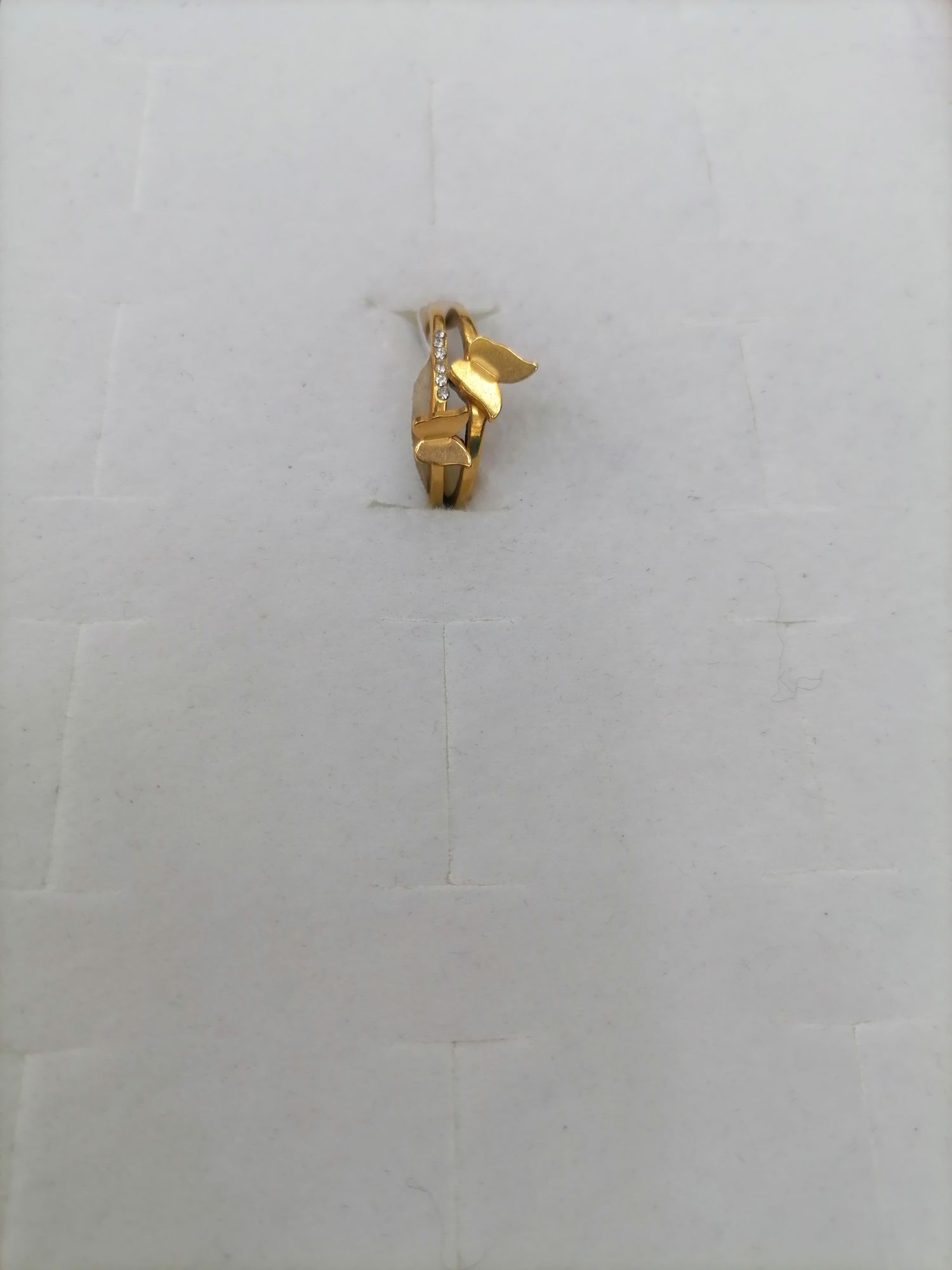 Titanium steel with a golden butterfly-shaped smooth surface design and 6 diamonds detail image 2