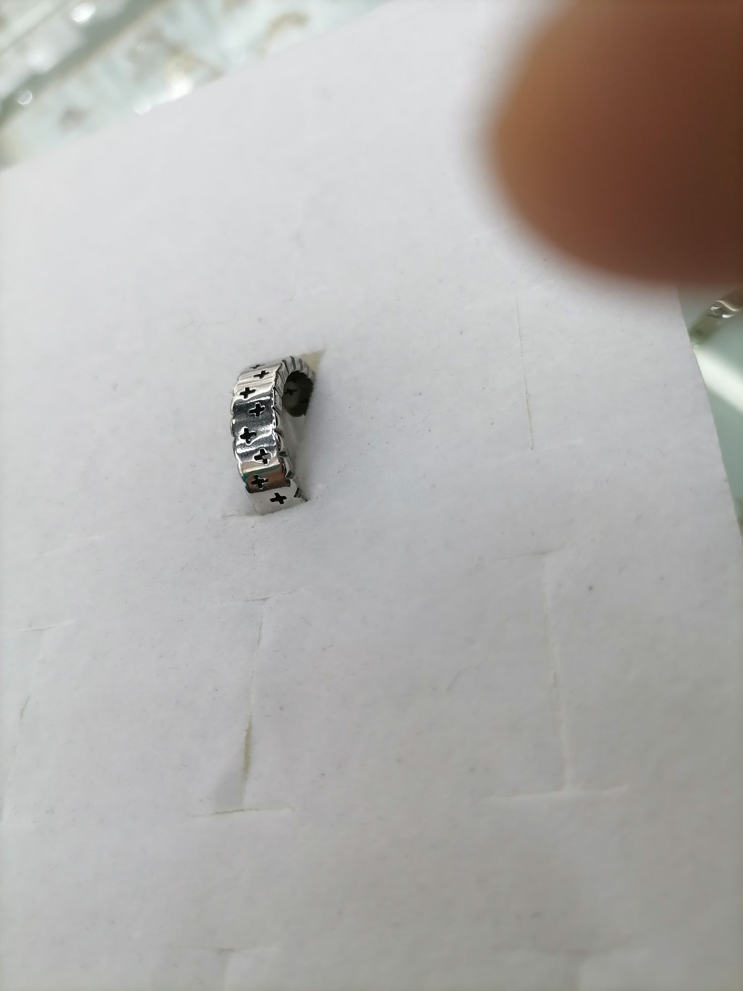 The titanium steel silver cross has a wide and thick pattern on the outside, making it a ring details Picture