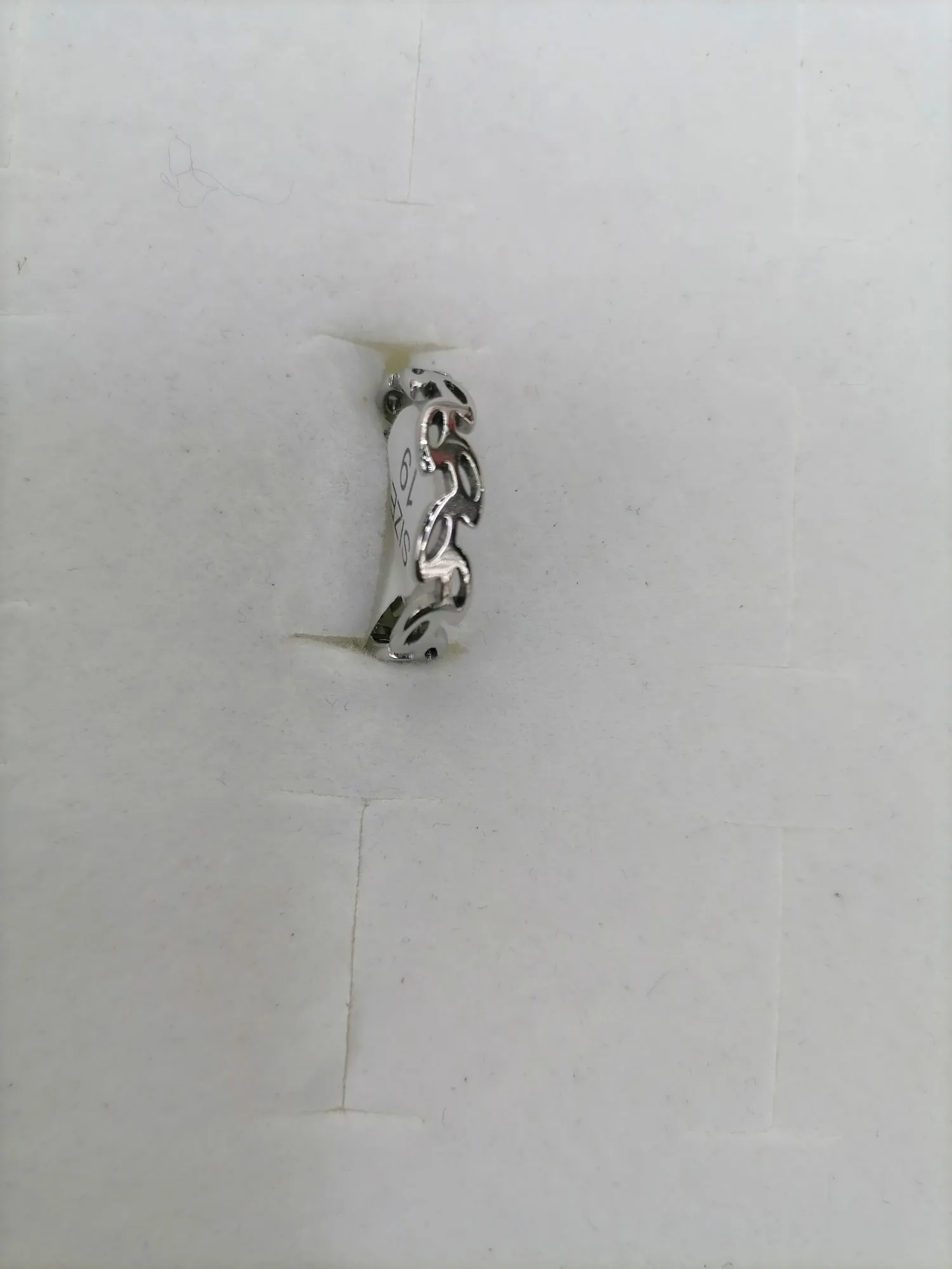Titanium steel silver perforated leaf-shaped layout design detail image 3